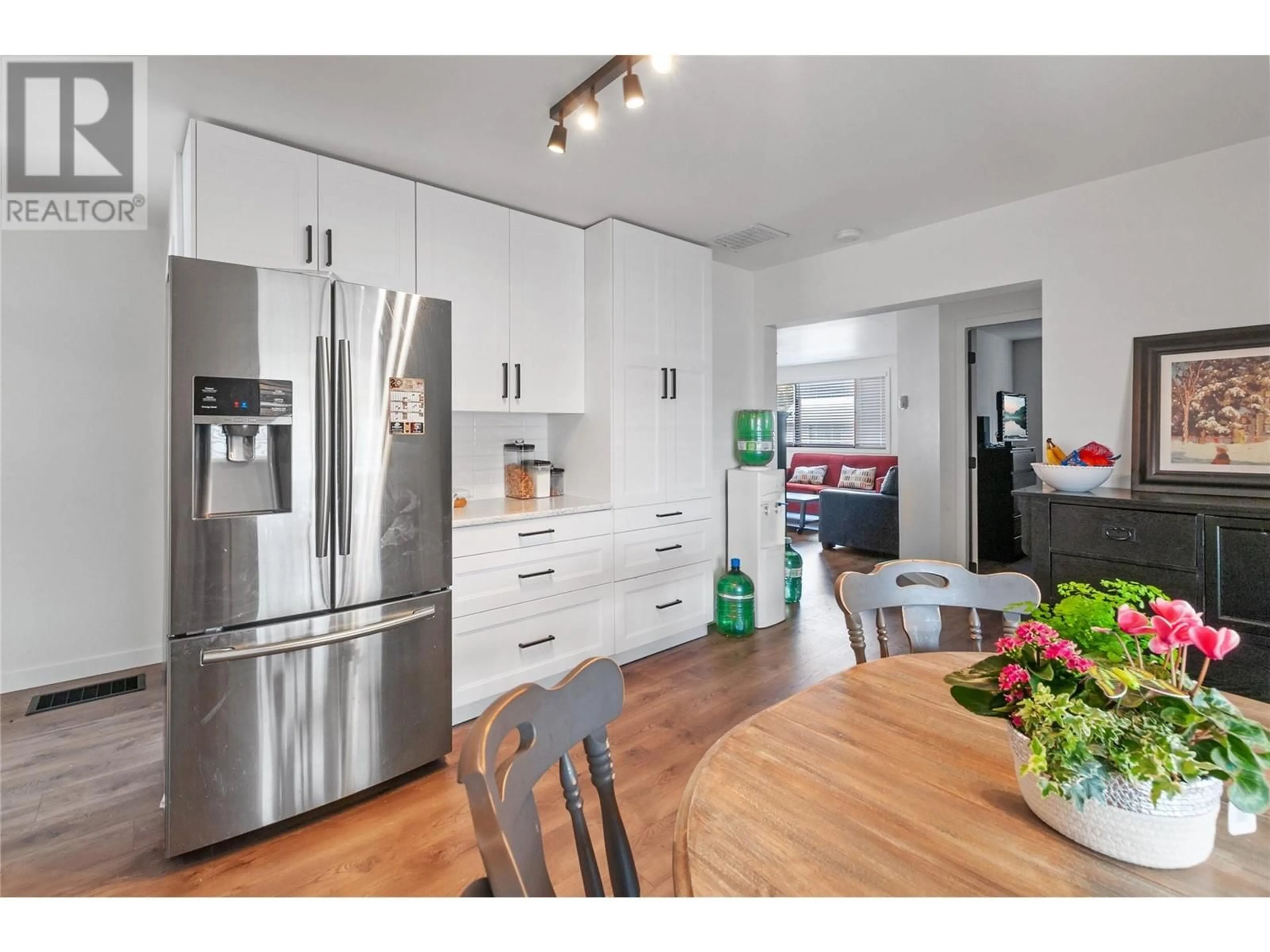 Open concept kitchen, wood/laminate floor for 166 DOLLIE Street, Princeton British Columbia V0X1W0