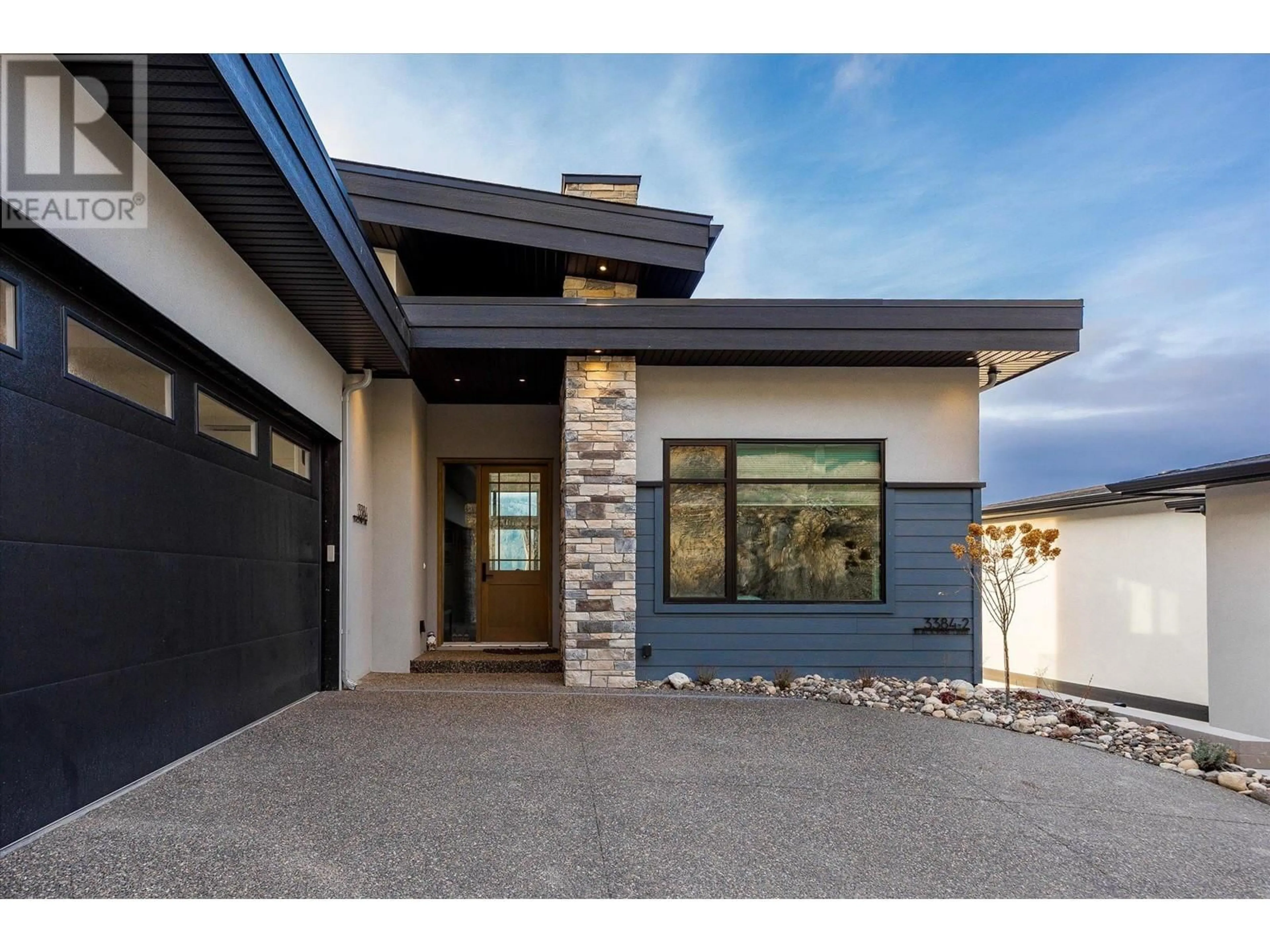 Home with brick exterior material, street for 3384 Black Pine Lane, Kelowna British Columbia V1V3G1