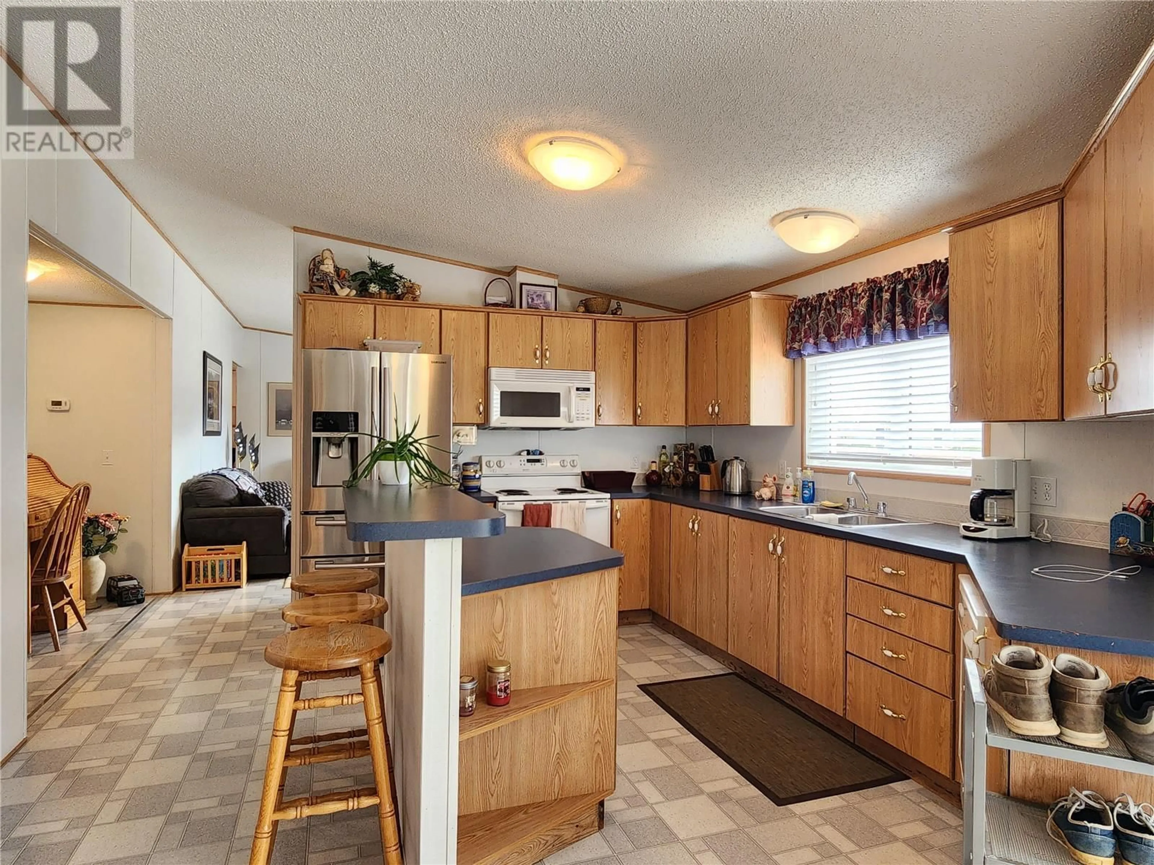 Open concept kitchen, unknown for 117 - 2035 BOUCHERIE ROAD, Westbank British Columbia V4T1Z7