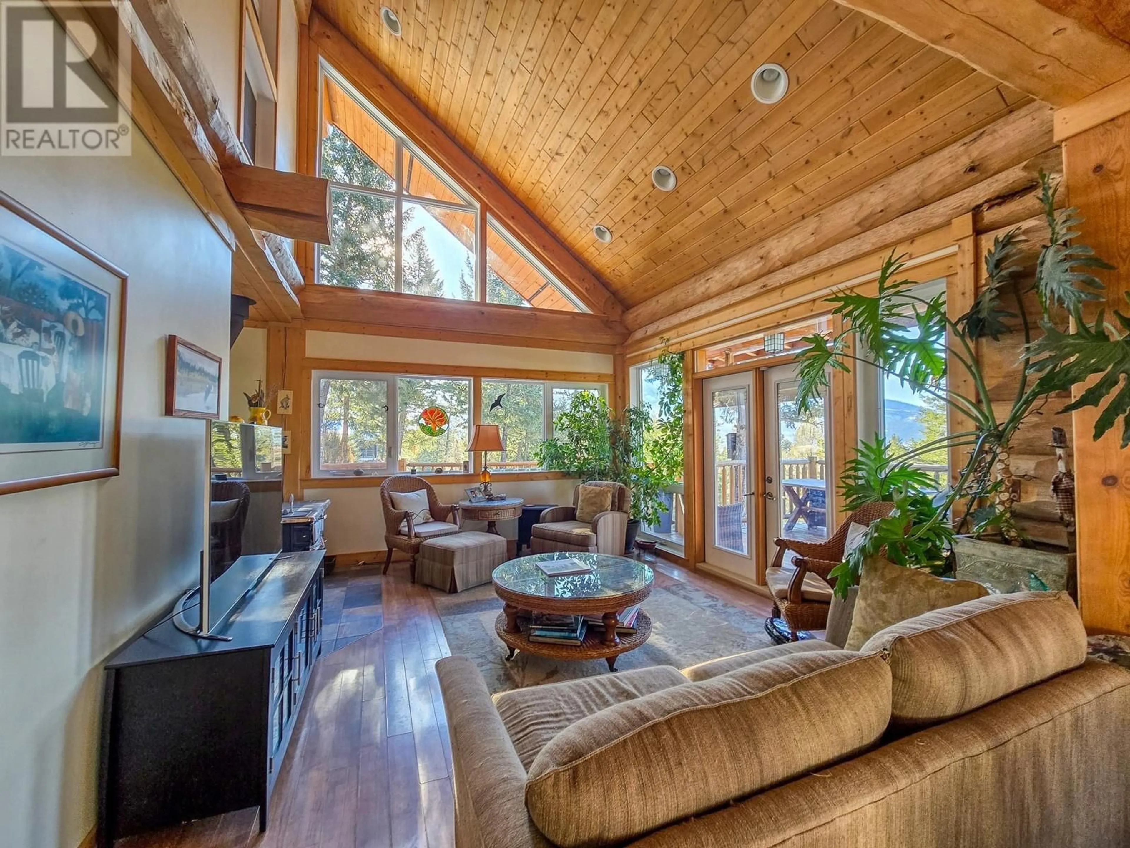 Living room with furniture, wood/laminate floor for 8403 Bighorn Sheep Lane, Canal Flats British Columbia V0B1B0