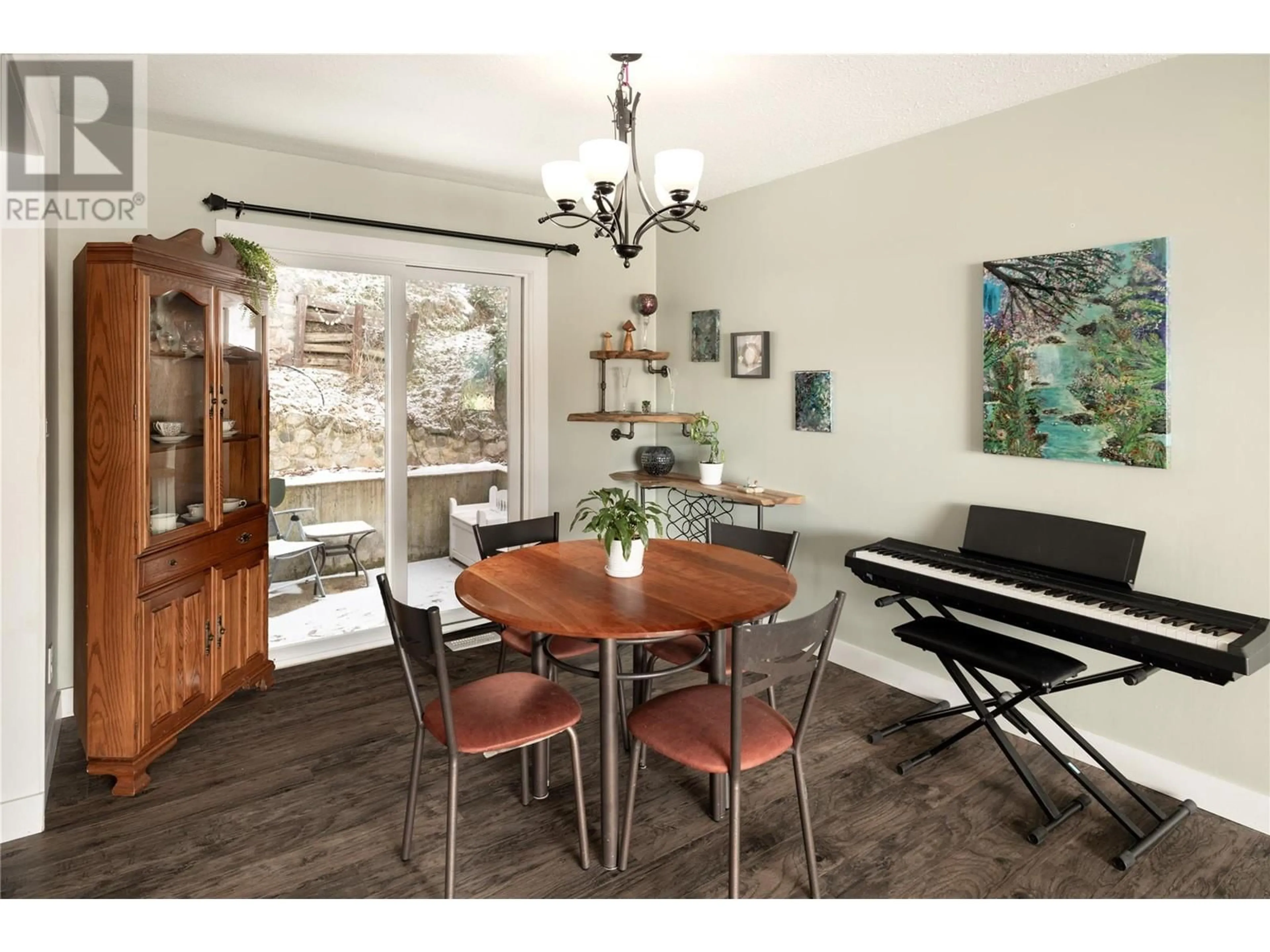 Dining room, wood/laminate floor for 3240 McGinnis Road, West Kelowna British Columbia V4T1A8