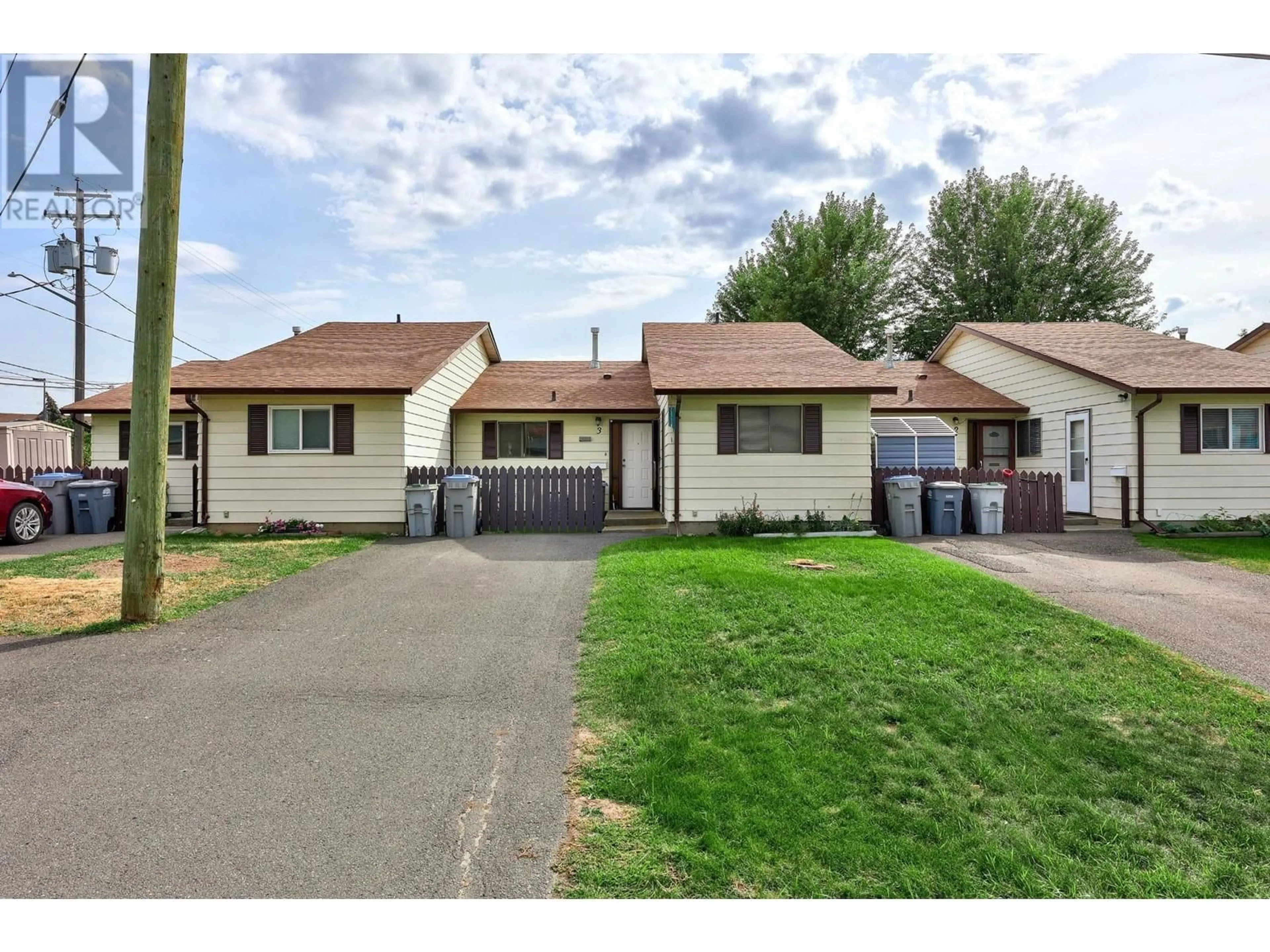 A pic from outside/outdoor area/front of a property/back of a property/a pic from drone, street for 840 DESMOND Street Unit# 3, Kamloops British Columbia V2B5K4