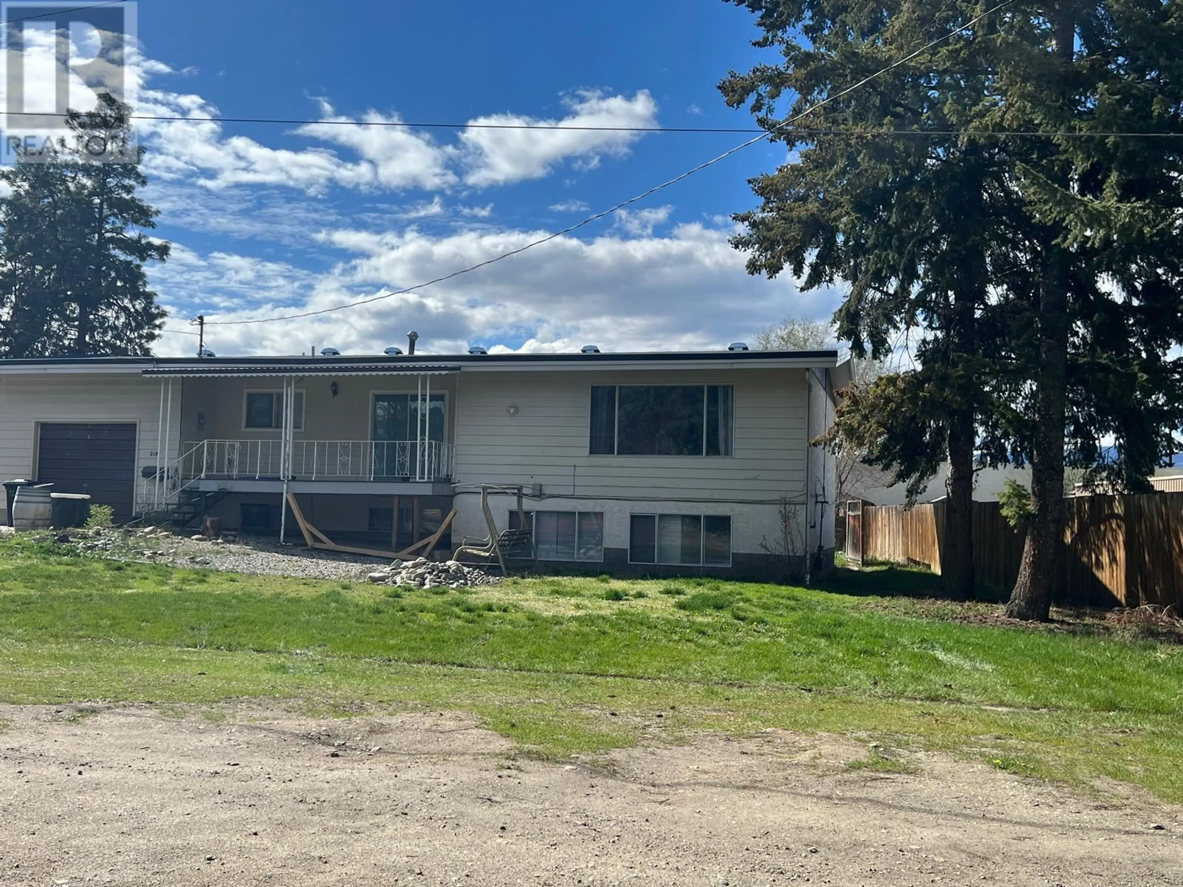 A pic from outside/outdoor area/front of a property/back of a property/a pic from drone, unknown for 210 Pemberton Road, Kelowna British Columbia V1X3H4