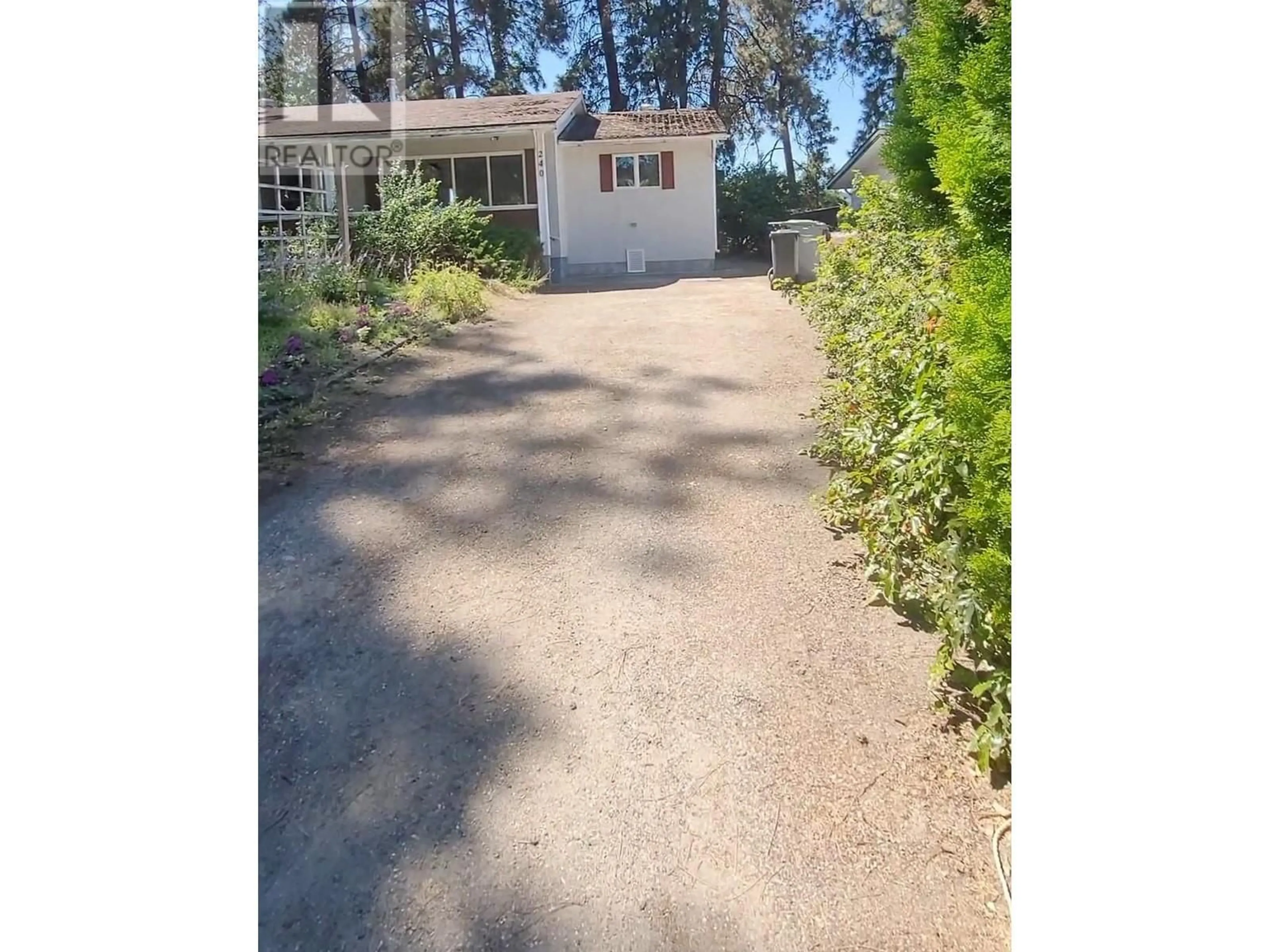 A pic from outside/outdoor area/front of a property/back of a property/a pic from drone, street for 240 Pemberton Road, Kelowna British Columbia V1X3H4