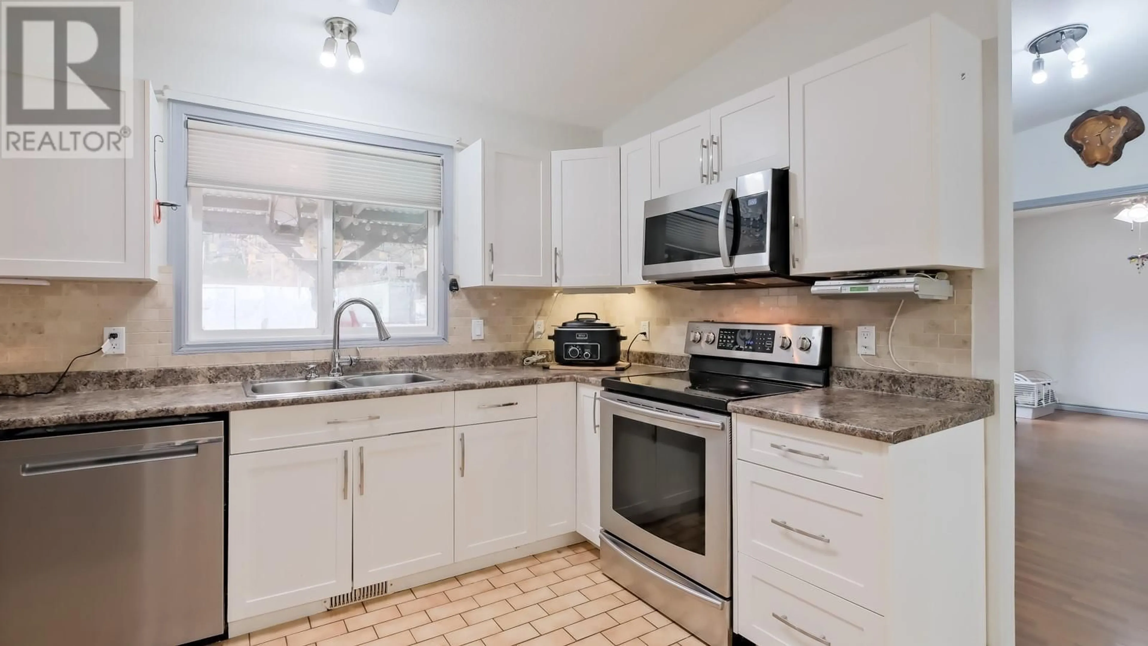 Standard kitchen, ceramic/tile floor for 3498 Ficke Road, West Kelowna British Columbia V4T1H5