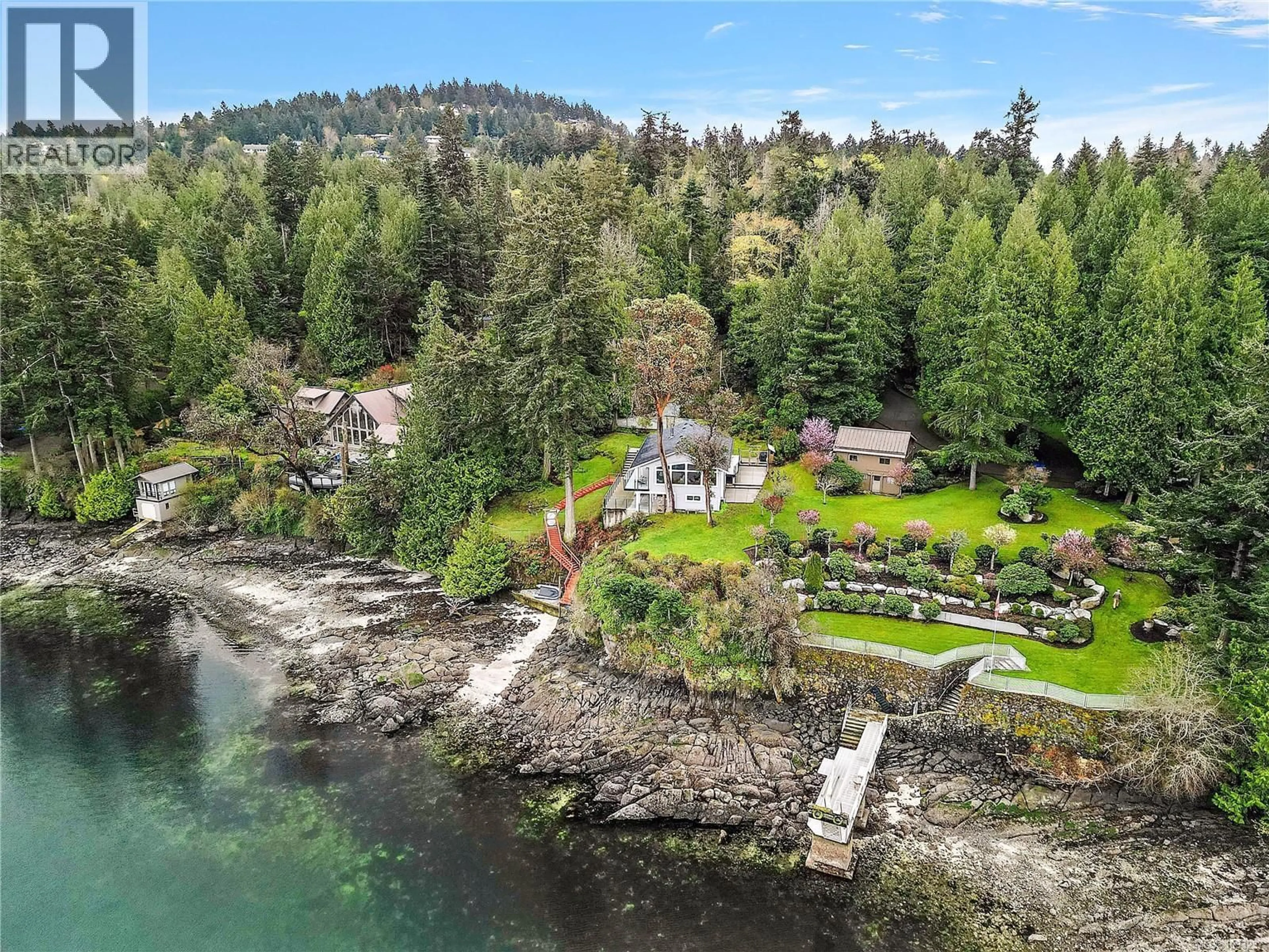 A pic from outside/outdoor area/front of a property/back of a property/a pic from drone, water/lake/river/ocean view for 976 LANDS END ROAD, North Saanich British Columbia V8L5L3