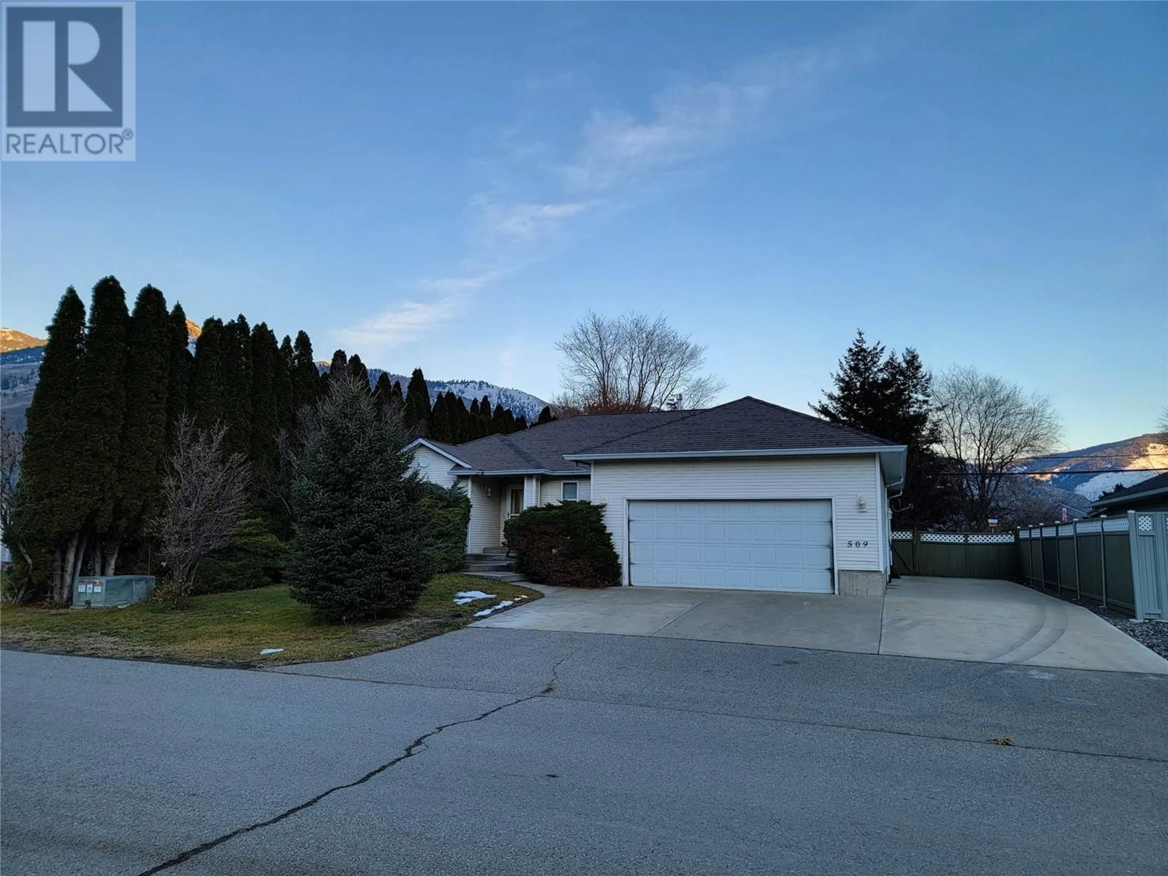 A pic from outside/outdoor area/front of a property/back of a property/a pic from drone, street for 509 Innis Place, Keremeos British Columbia V0X1N5