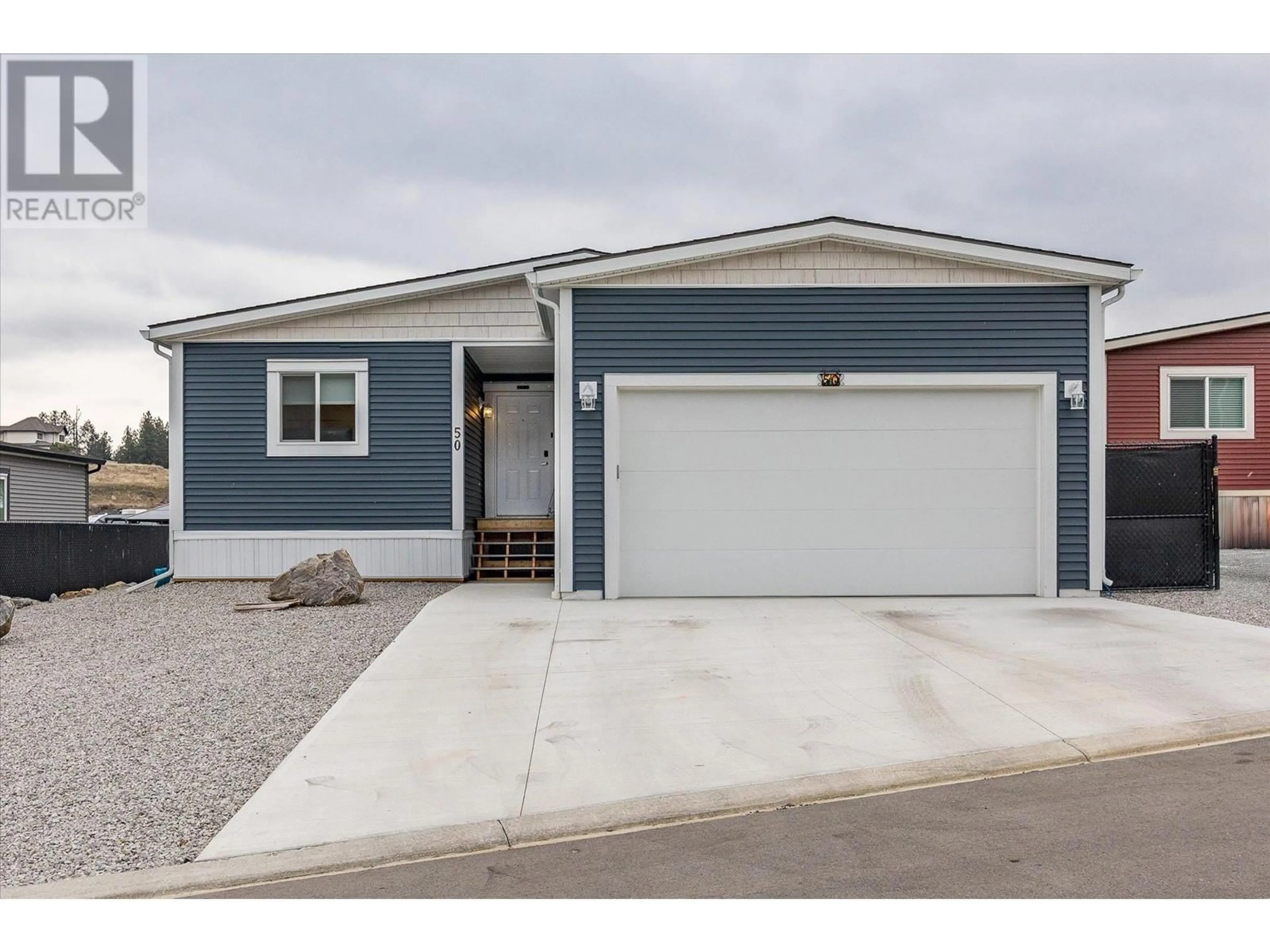 Home with vinyl exterior material, street for 1835 Nancee Way Unit# 50, West Kelowna British Columbia V1Z4C1