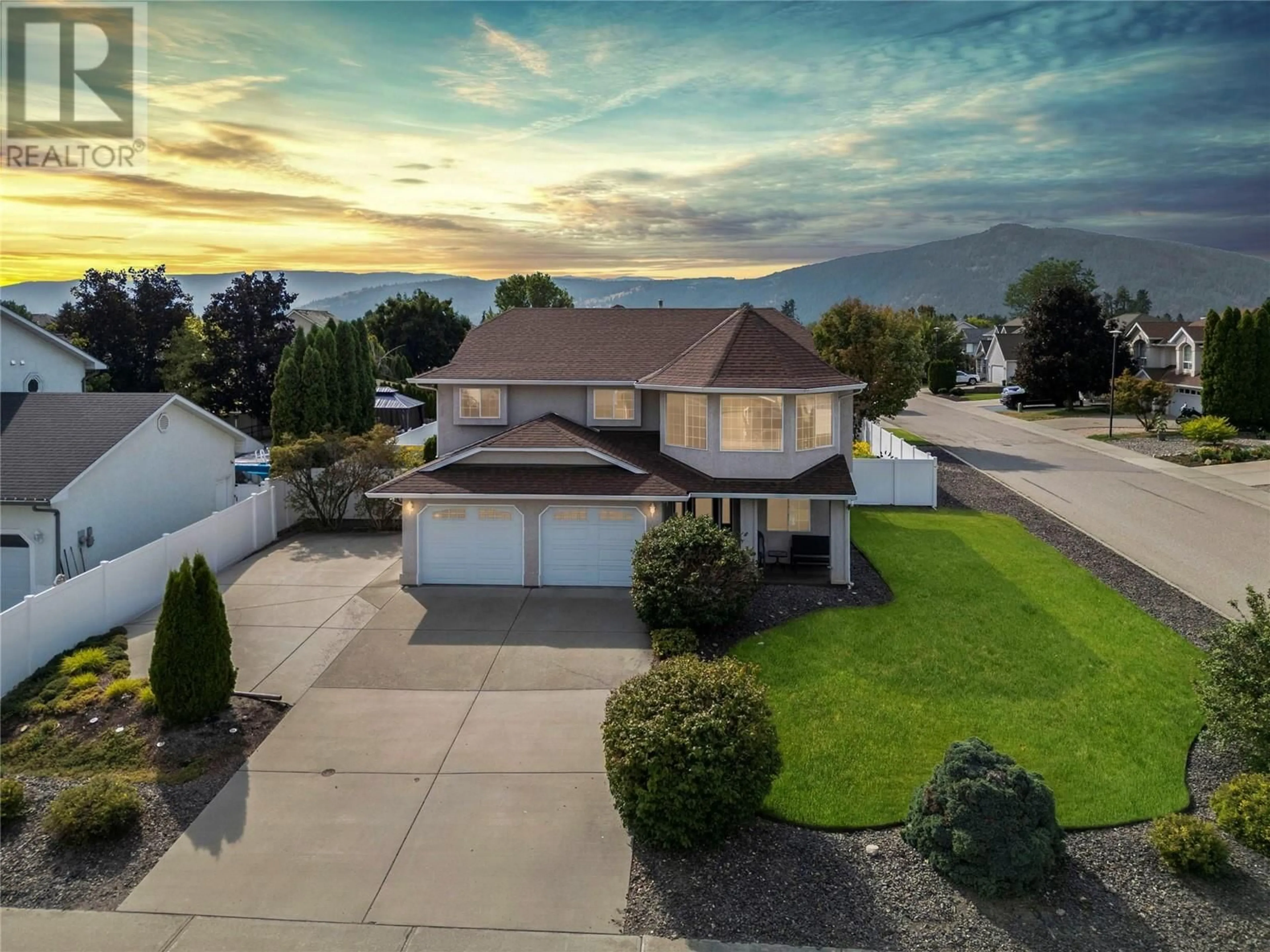 A pic from outside/outdoor area/front of a property/back of a property/a pic from drone, mountain view for 2047 Norman Street Lot# 14, Armstrong British Columbia V0E1B1