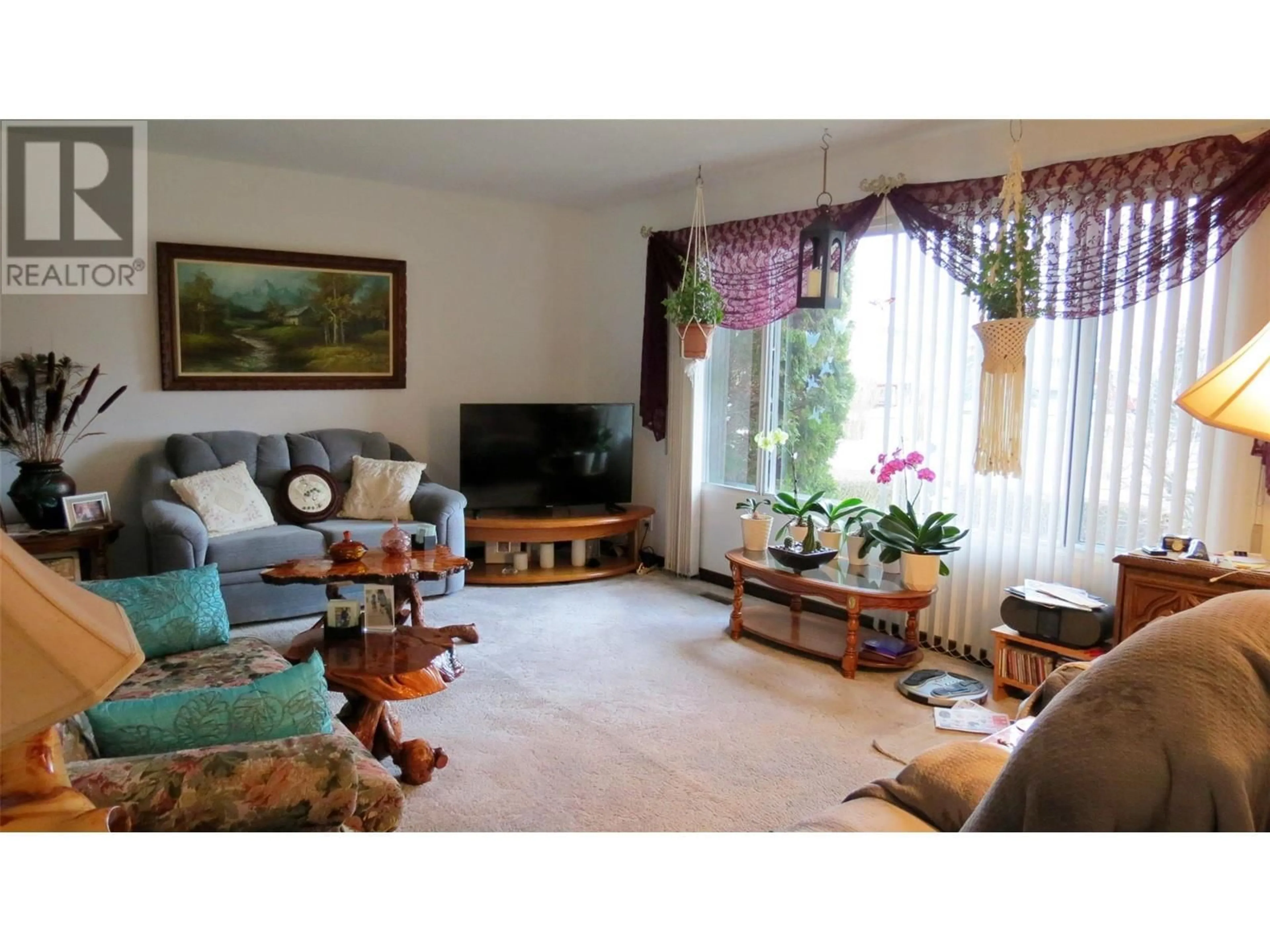 Living room with furniture, unknown for 459 Pottery Road, Vernon British Columbia V1B3A8