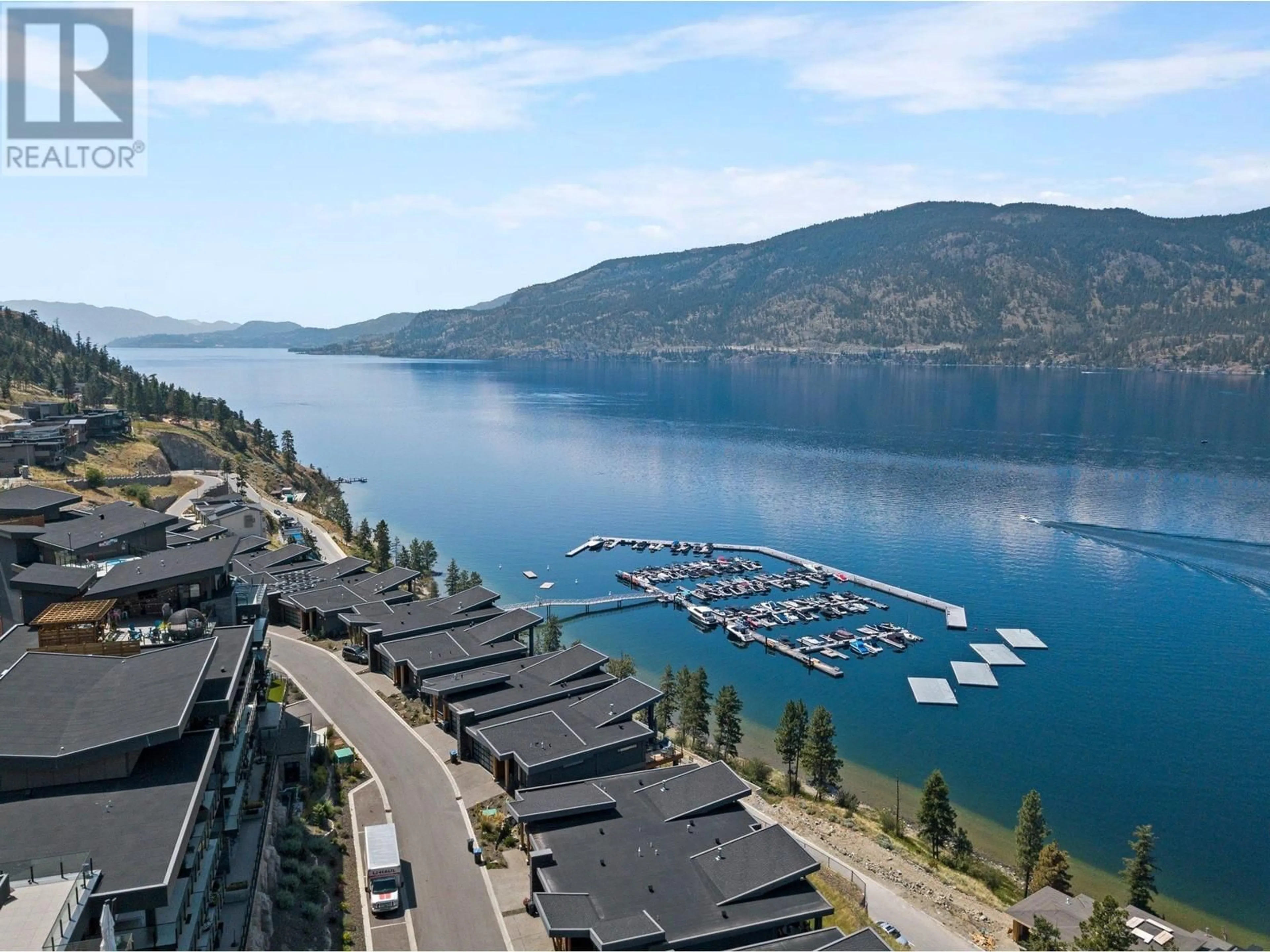 A pic from outside/outdoor area/front of a property/back of a property/a pic from drone, water/lake/river/ocean view for 3475 Granite Close Unit# 312, Kelowna British Columbia V1V0B9