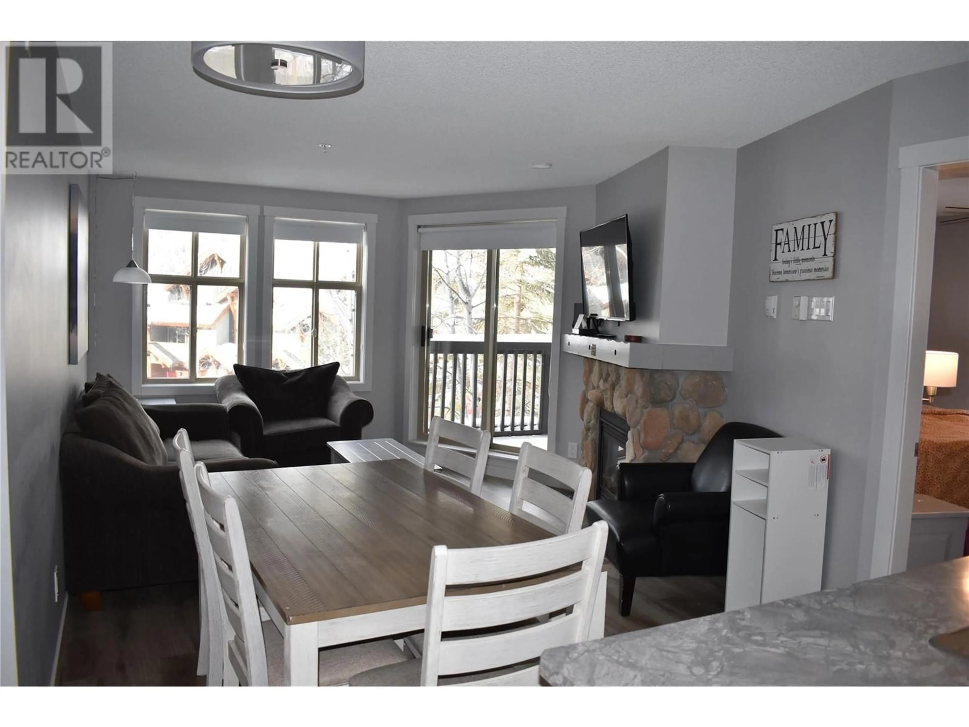 Living room with furniture, wood/laminate floor for 2060 SUMMIT Drive Unit# 214, Panorama British Columbia V0A1T0