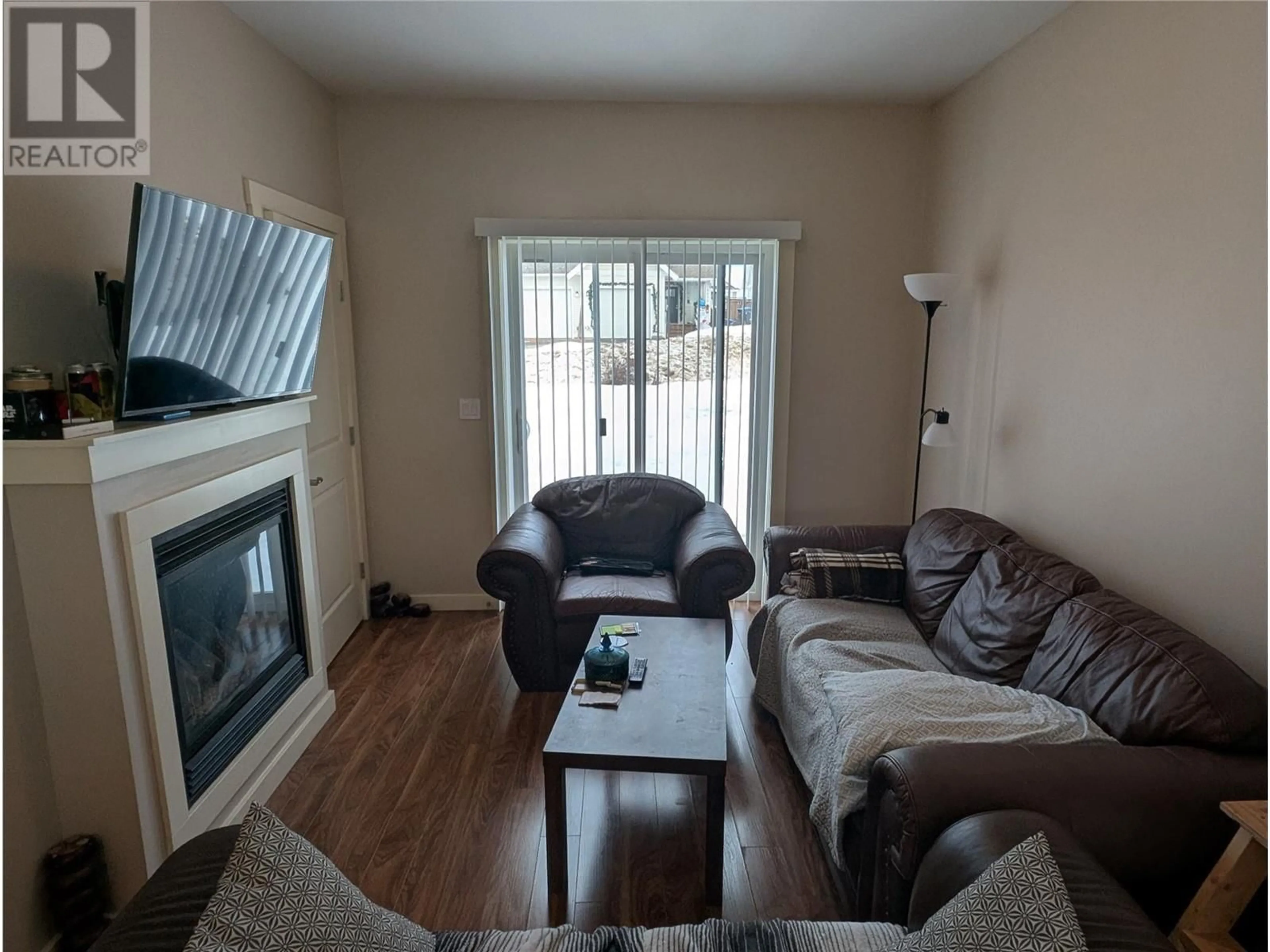 Living room with furniture, unknown for 301 - 1617 88 AVENUE, Dawson Creek British Columbia V1G0E8