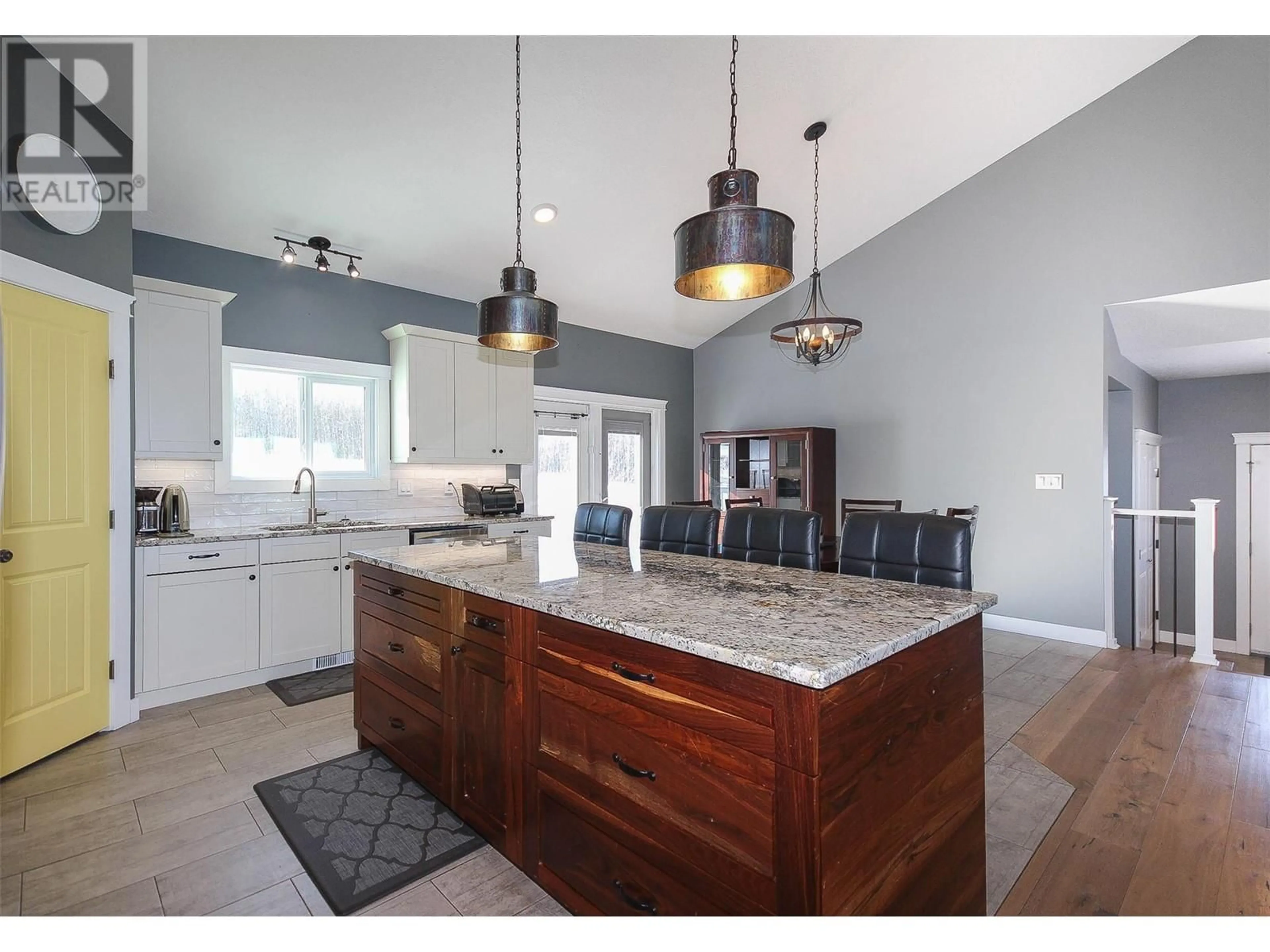 Open concept kitchen, ceramic/tile floor for 5543 97 Highway, Dawson Creek British Columbia V0C1B0