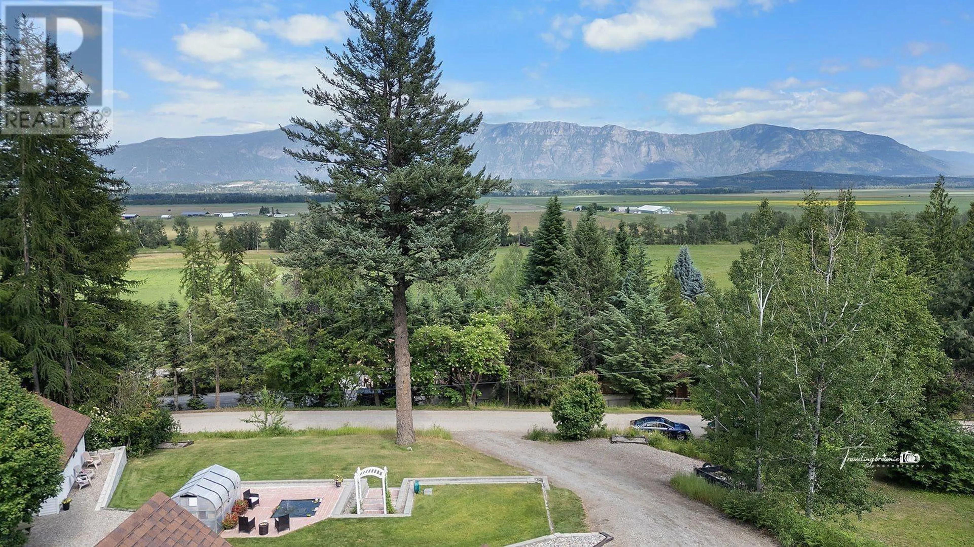 A pic from outside/outdoor area/front of a property/back of a property/a pic from drone, mountain view for 931 PETERMAN Road, Creston British Columbia V0B1G7