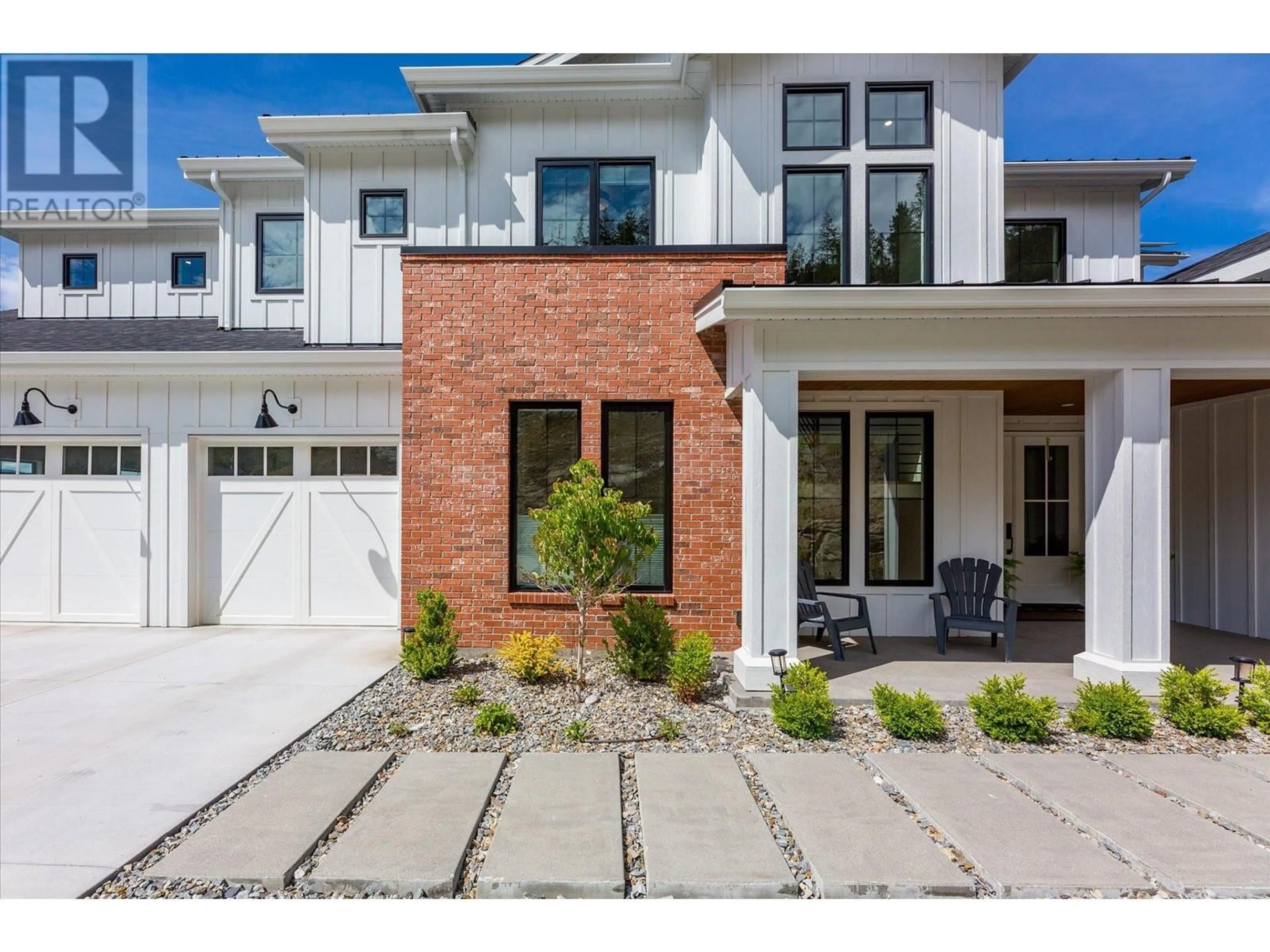 Home with brick exterior material, street for 5711 Jasper Way, Kelowna British Columbia V1W4L5