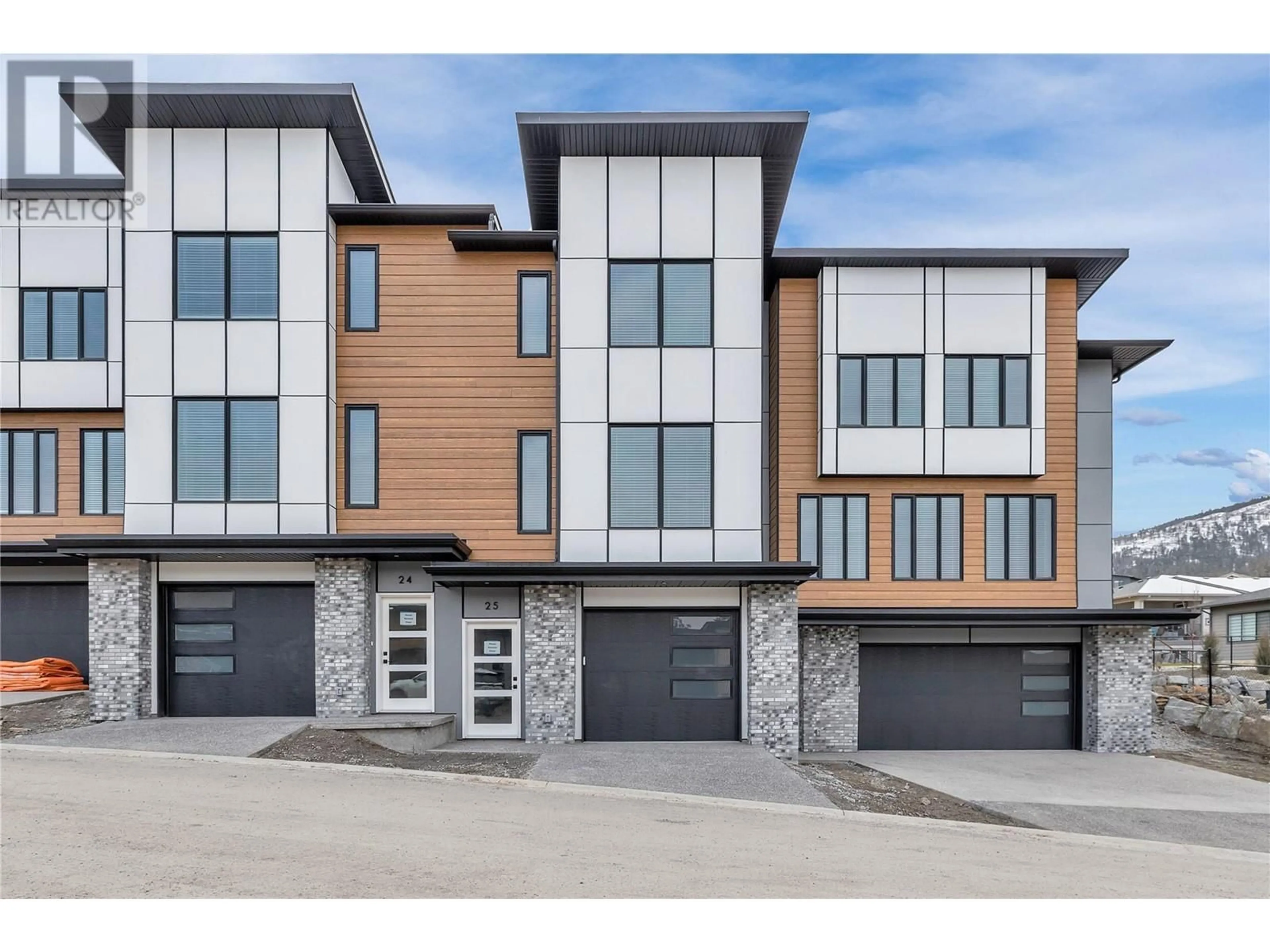 Home with brick exterior material, street for 2835 Canyon Crest Drive Unit# 24, West Kelowna British Columbia V4T0E3