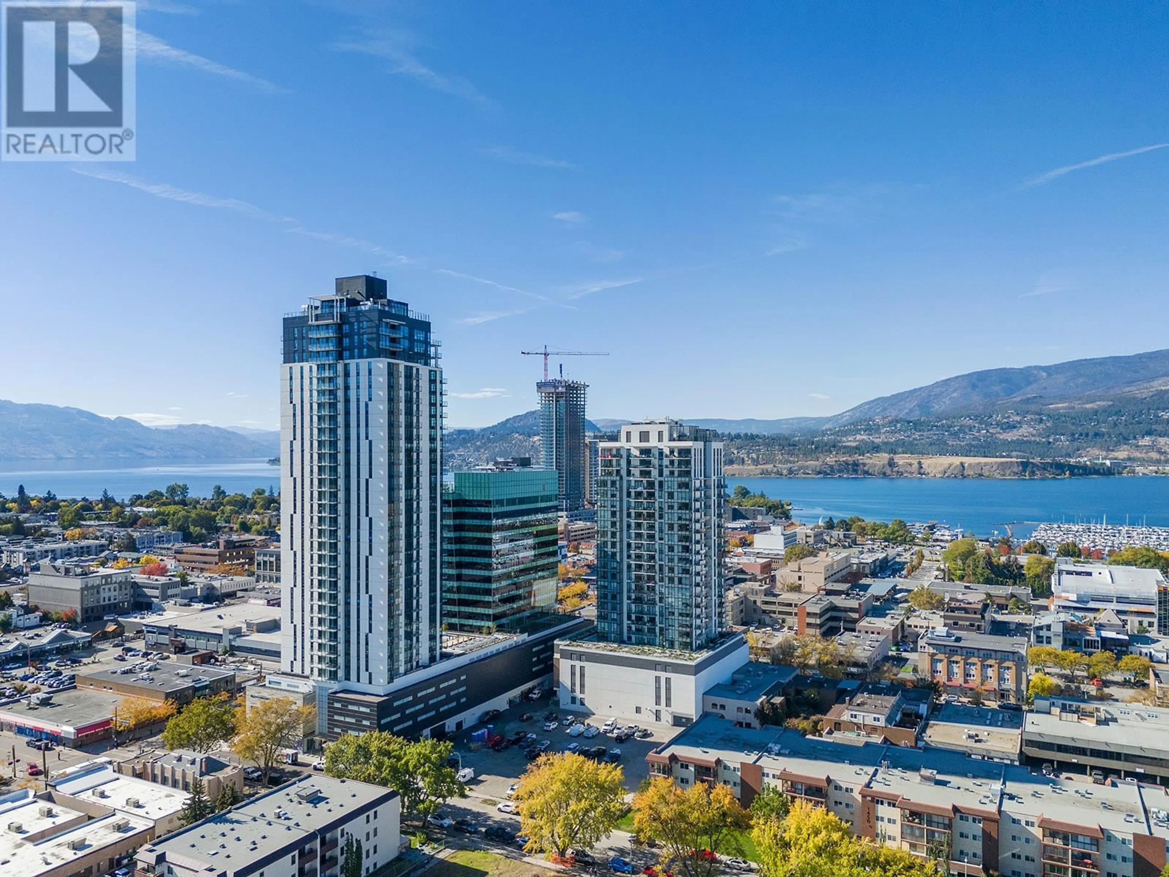 A pic from outside/outdoor area/front of a property/back of a property/a pic from drone, city buildings view from balcony for 1488 Bertram Street Unit# 1802, Kelowna British Columbia V1Y6P2