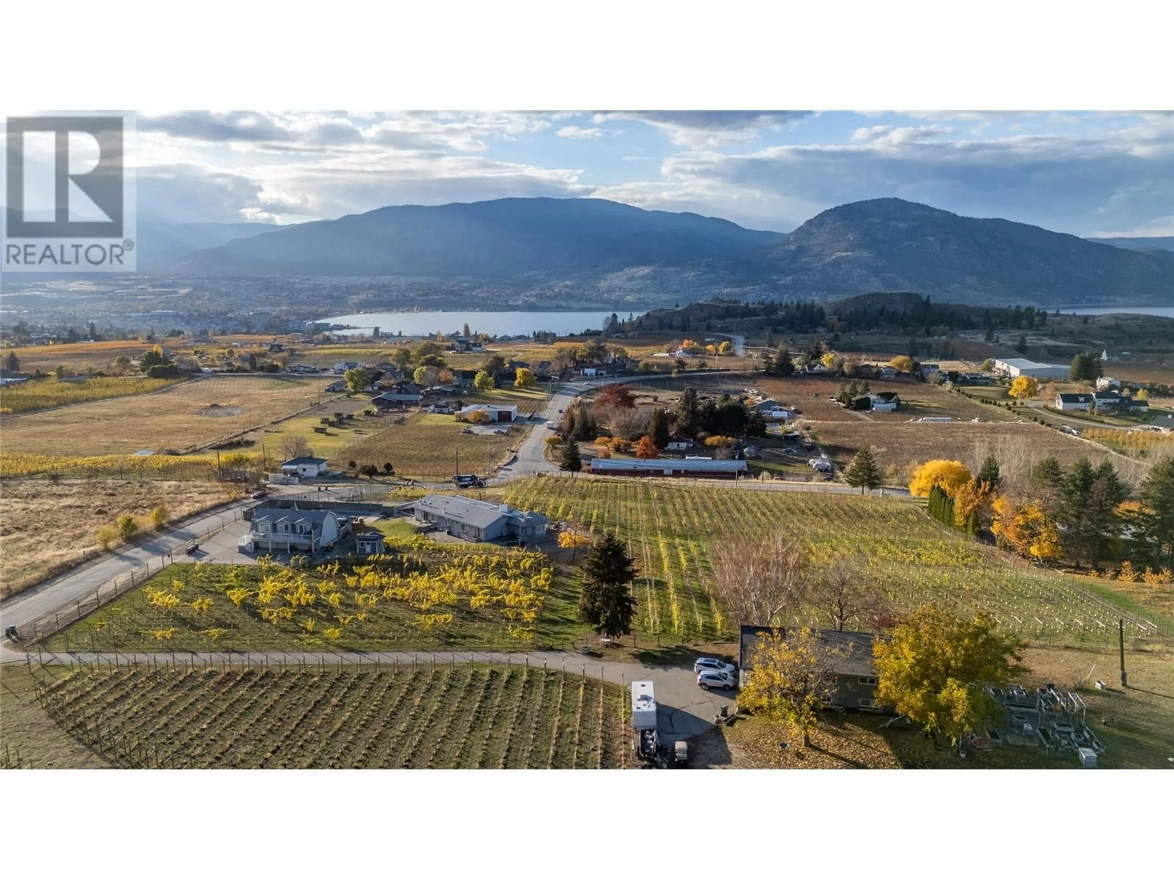 A pic from outside/outdoor area/front of a property/back of a property/a pic from drone, mountain view for 510 Naramata Road, Penticton British Columbia V2A8T3