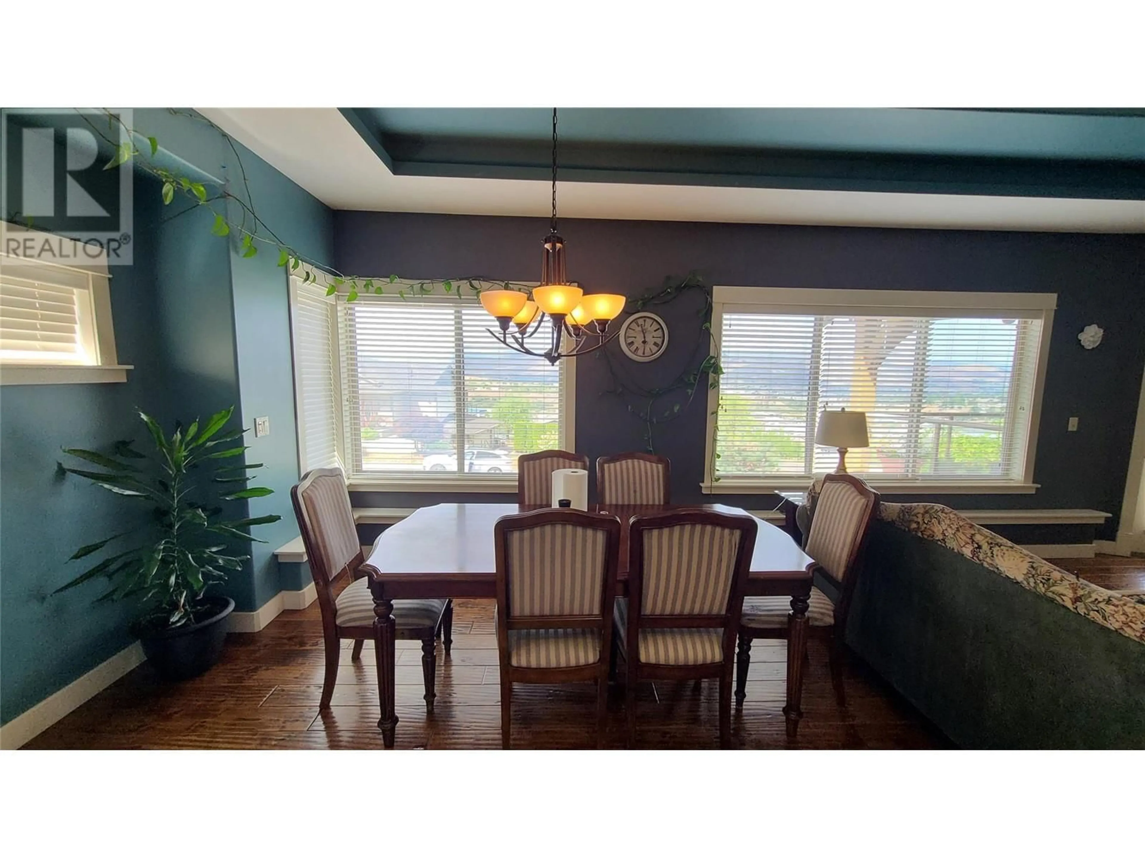 Dining room, wood/laminate floor for 1047 Mt Ida Drive, Vernon British Columbia V1B4A7