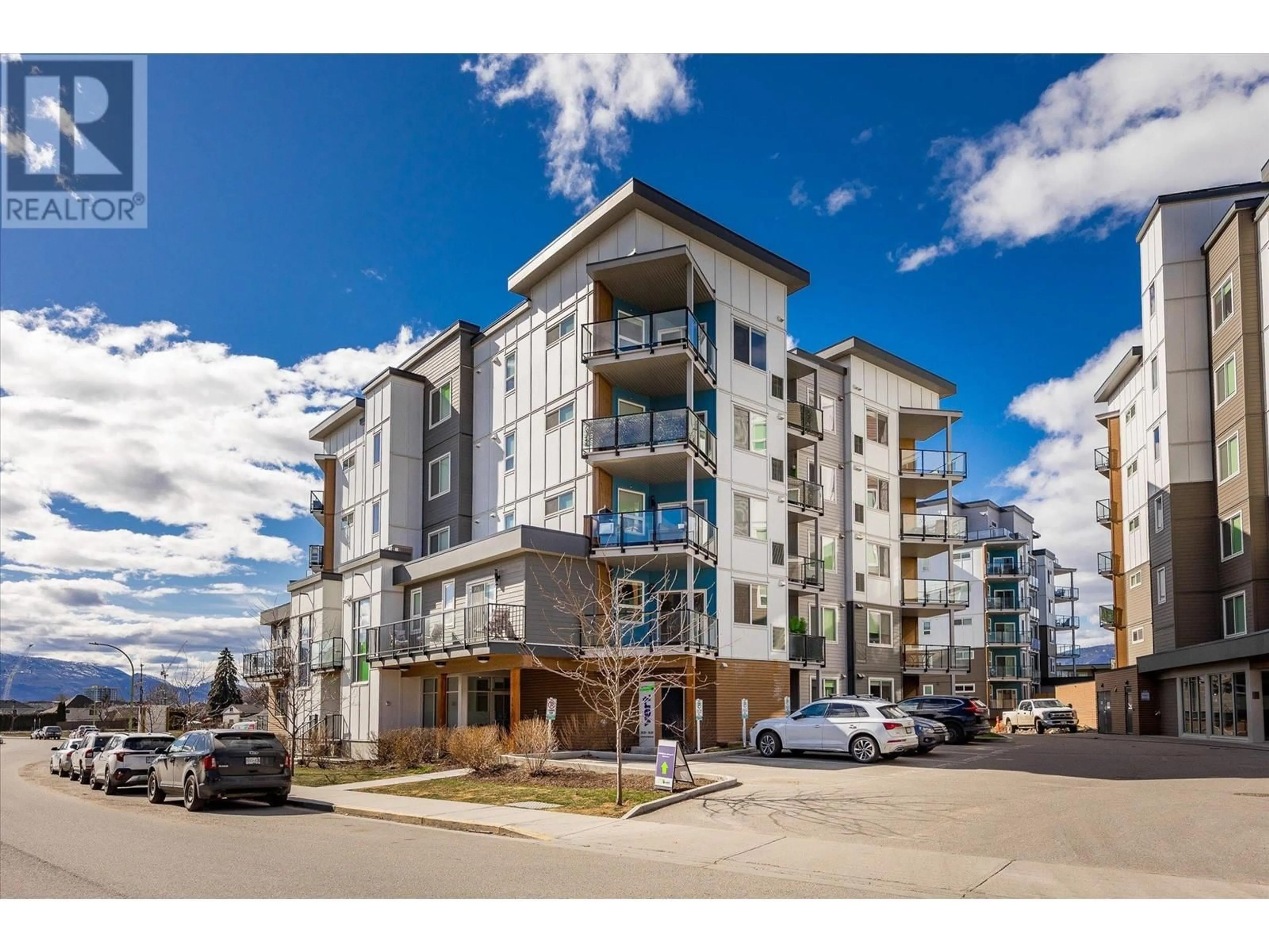 A pic from outside/outdoor area/front of a property/back of a property/a pic from drone, street for 3638 Mission Springs Drive Unit# 505, Kelowna British Columbia V1W0B3