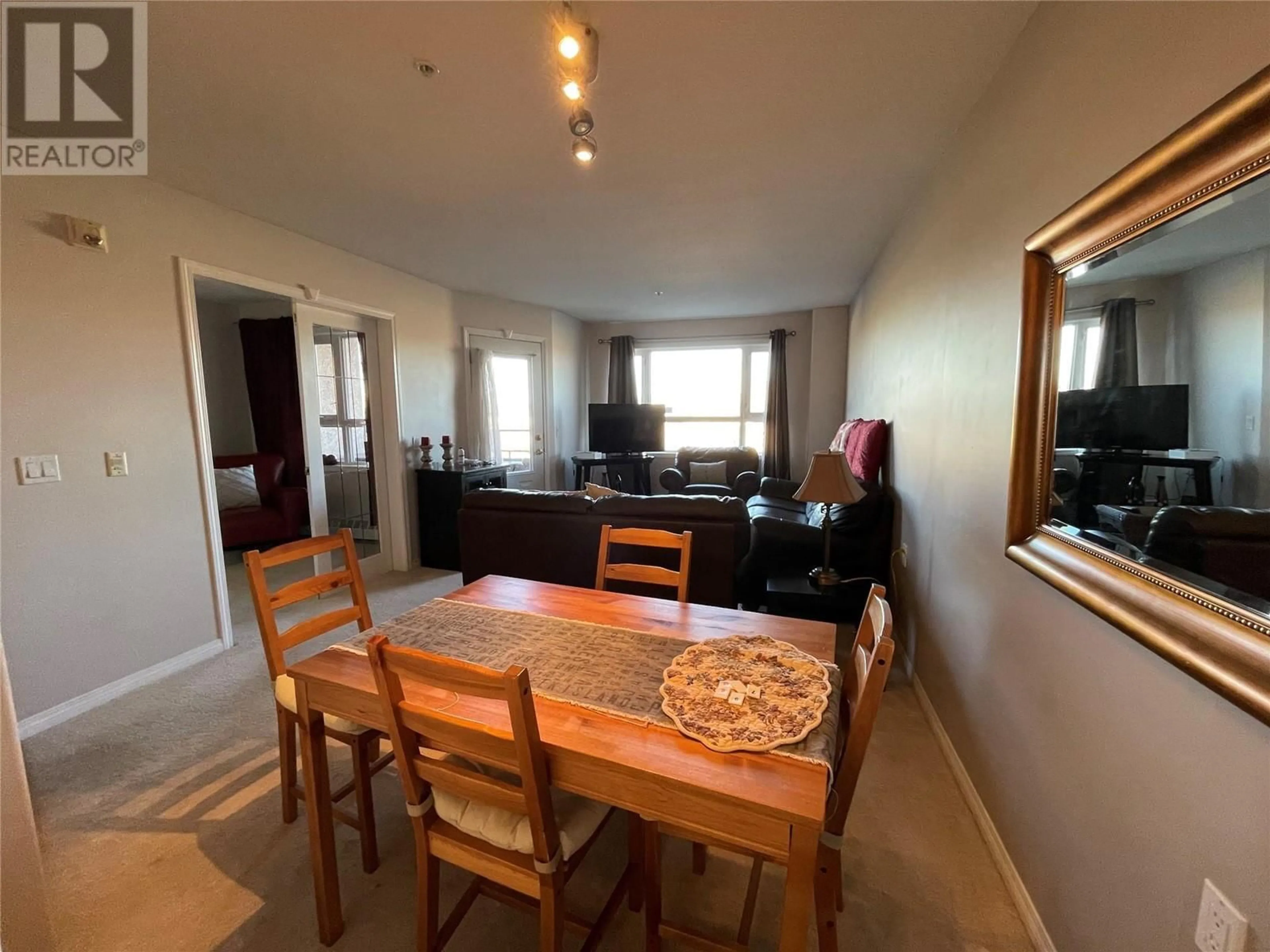 Dining room, wood/laminate floor for 11001 13 Street Unit# 201, Dawson Creek British Columbia V1G2X5