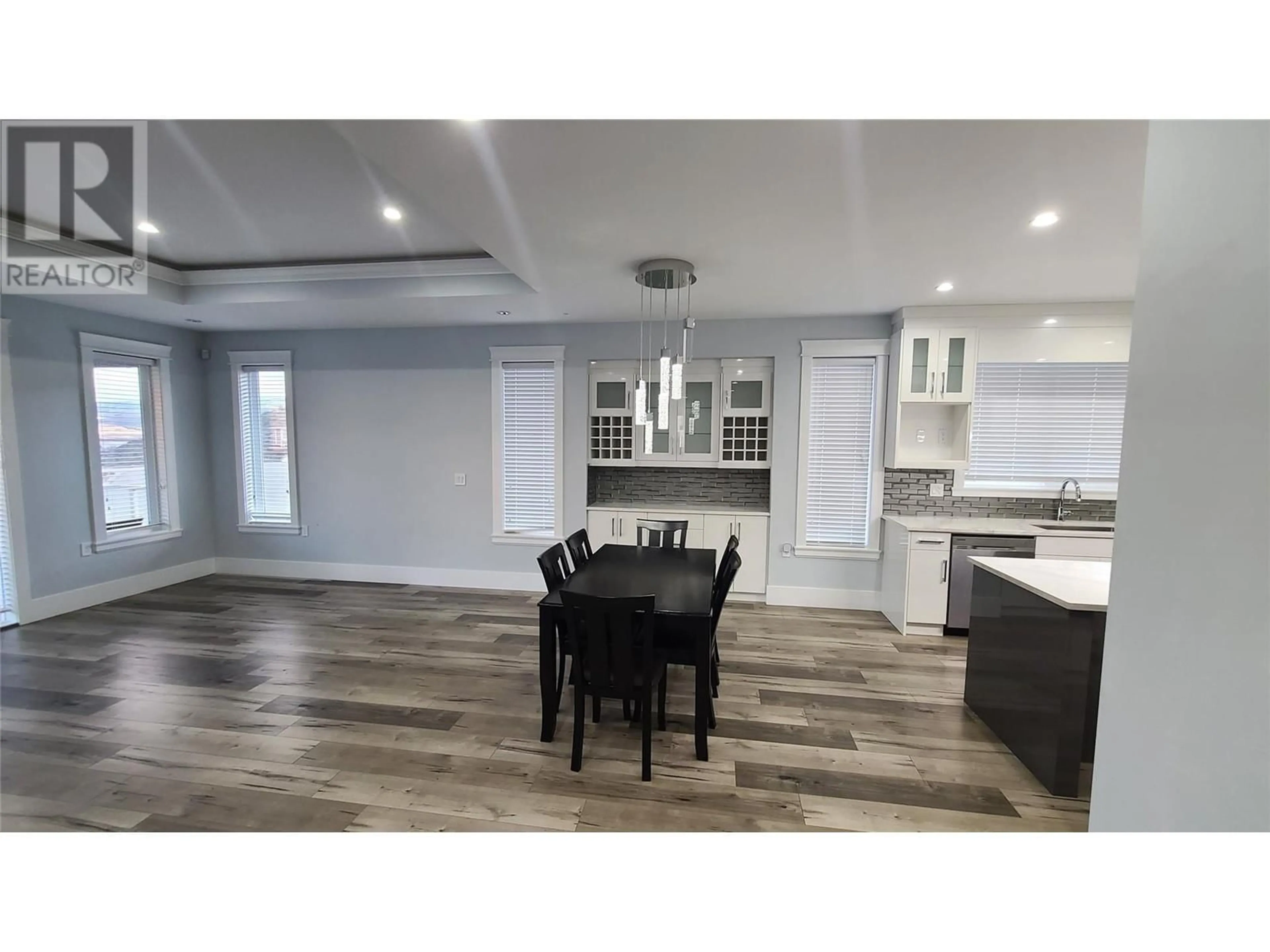 Open concept kitchen, wood/laminate floor for 3614 TORREY PINES Drive, Osoyoos British Columbia V0H1V4