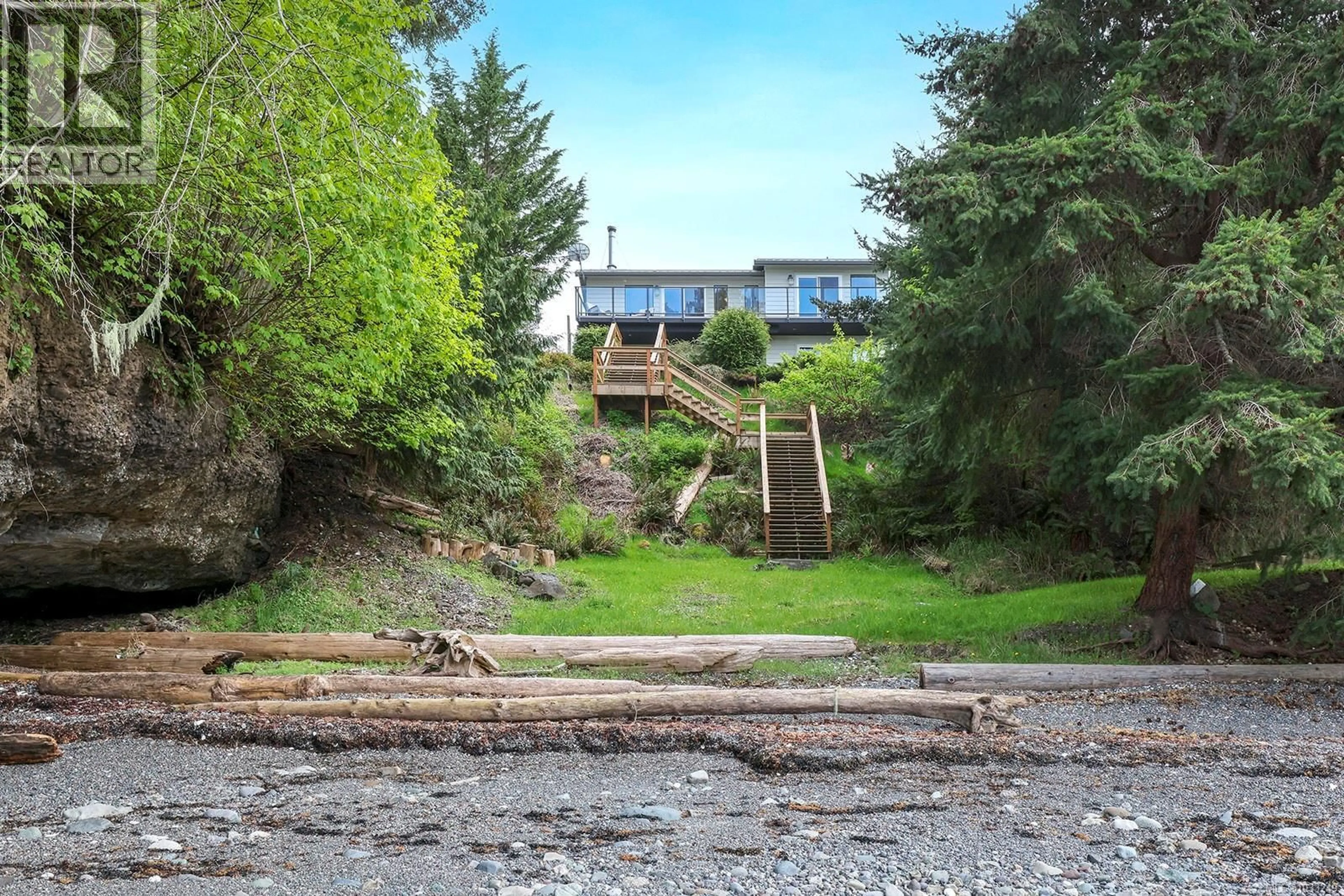 A pic from outside/outdoor area/front of a property/back of a property/a pic from drone, unknown for 3640 EAST ROAD, Denman Island British Columbia V0R1T0
