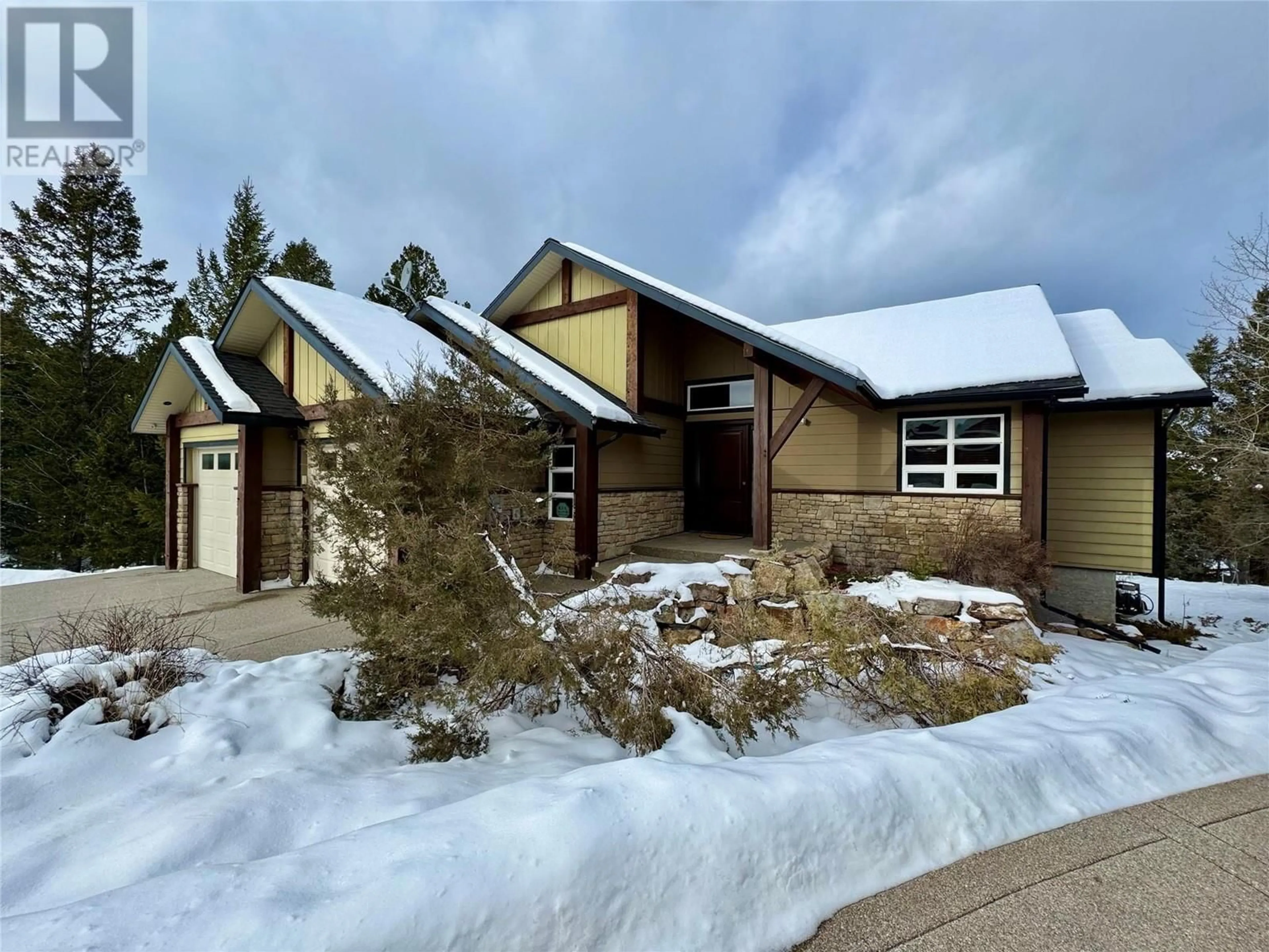 Home with brick exterior material, street for 1502 PINERIDGE MOUNTAIN Place, Invermere British Columbia V0A1K0