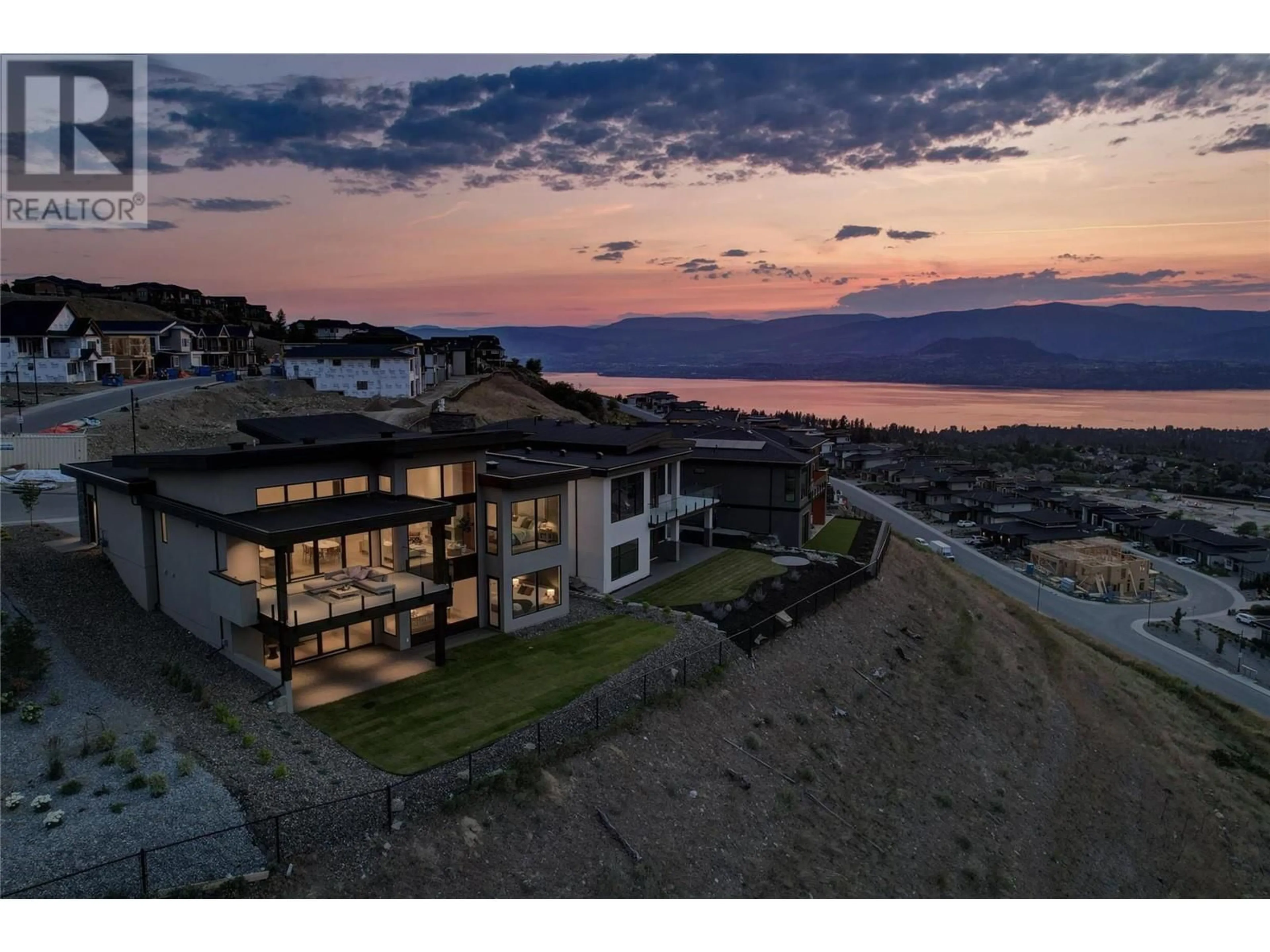 A pic from outside/outdoor area/front of a property/back of a property/a pic from drone, water/lake/river/ocean view for 1054 Emslie Street, Kelowna British Columbia V1W5J1