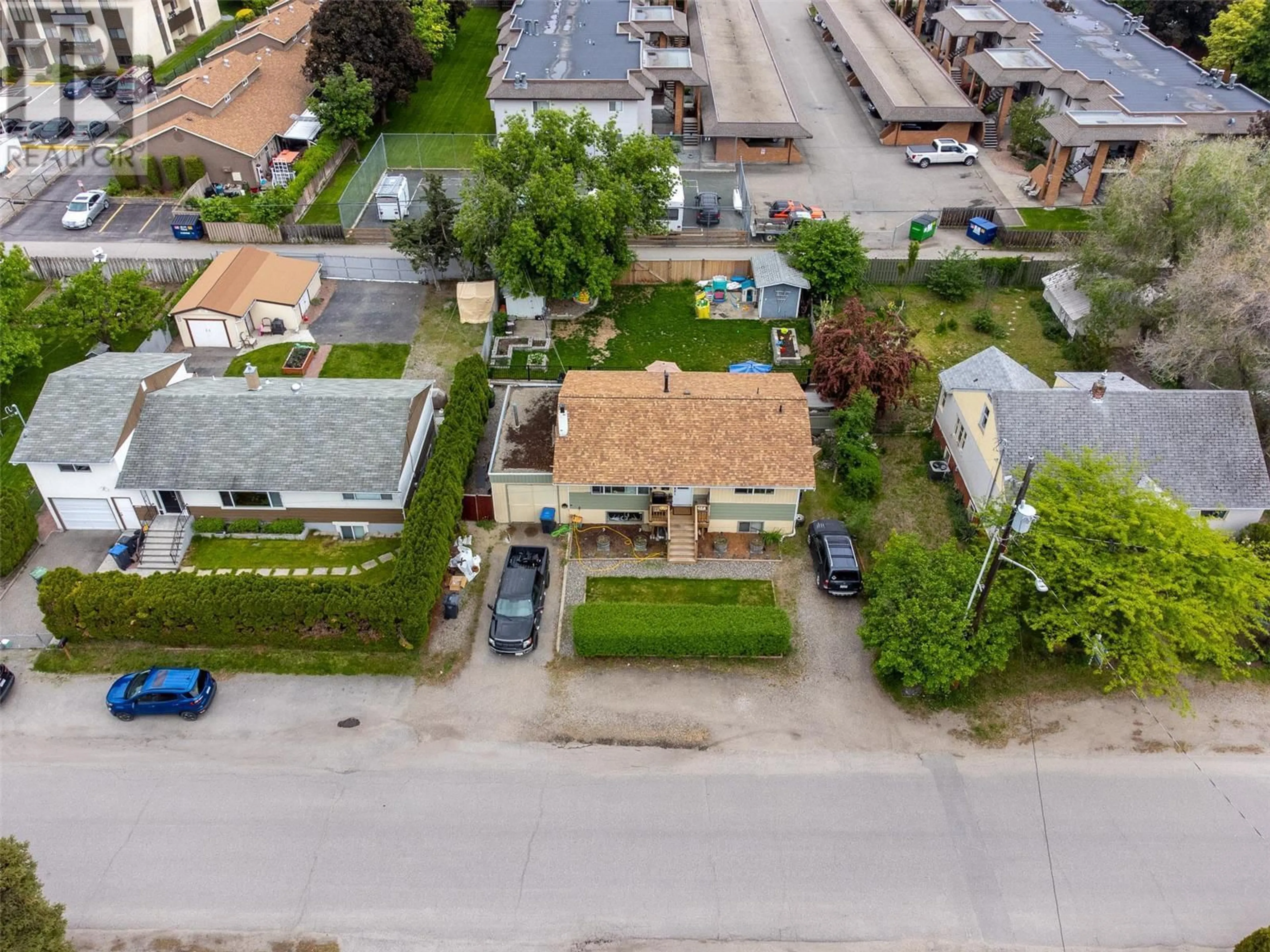 A pic from outside/outdoor area/front of a property/back of a property/a pic from drone, street for 235 Ponto Road, Kelowna British Columbia V1X2G2