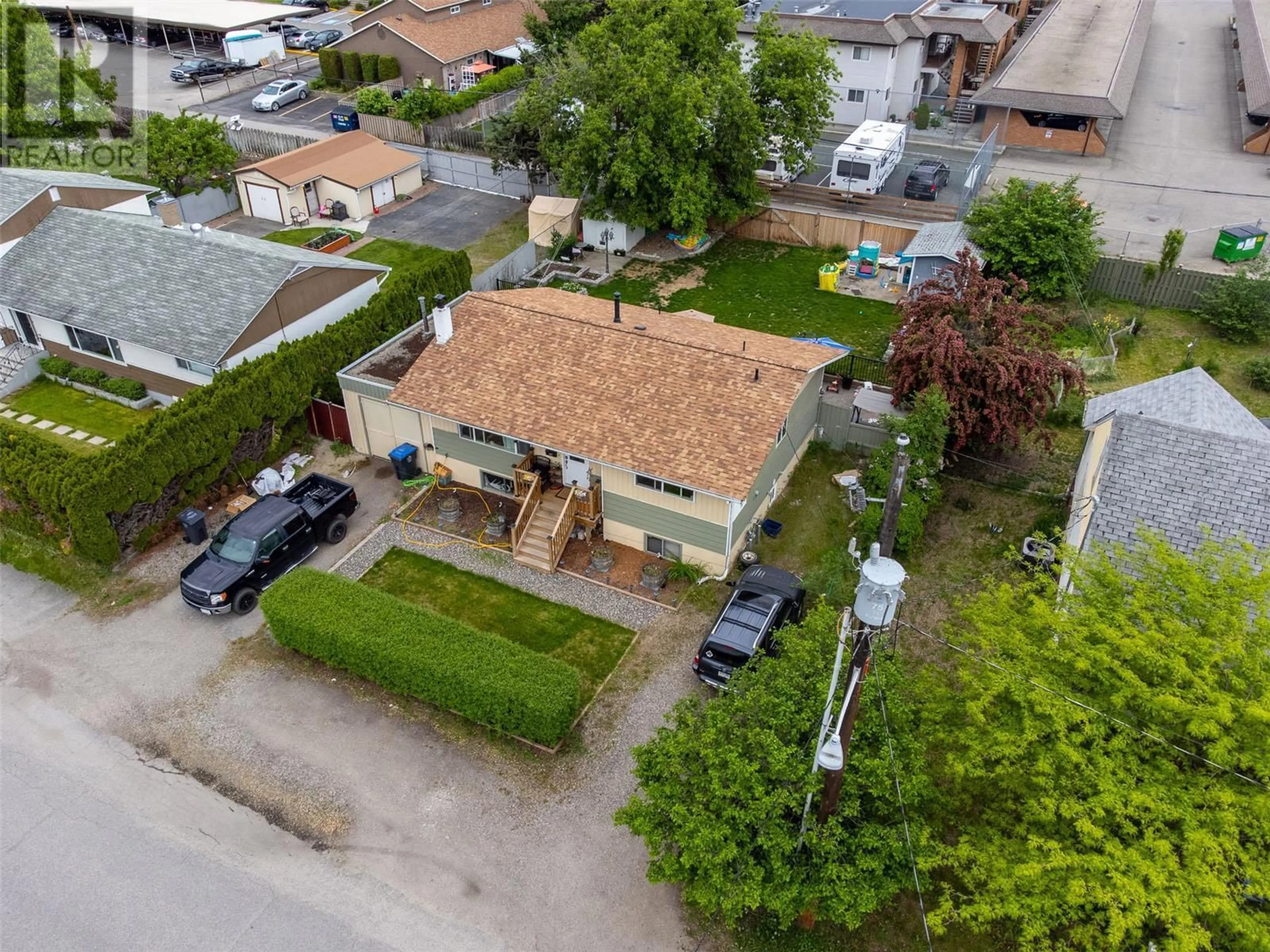 A pic from outside/outdoor area/front of a property/back of a property/a pic from drone, street for 235 Ponto Road, Kelowna British Columbia V1X2G2