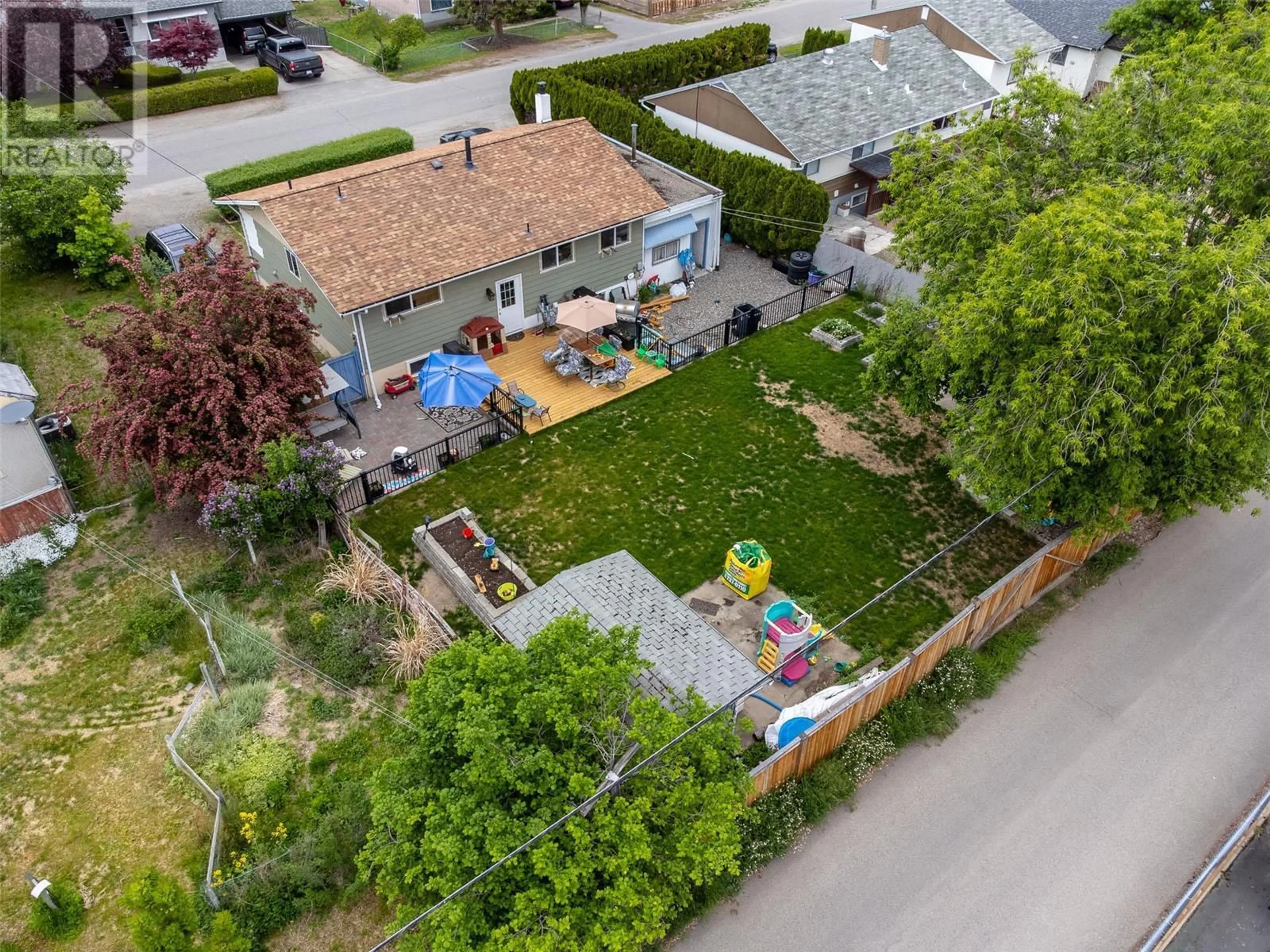 A pic from outside/outdoor area/front of a property/back of a property/a pic from drone, street for 235 Ponto Road, Kelowna British Columbia V1X2G2