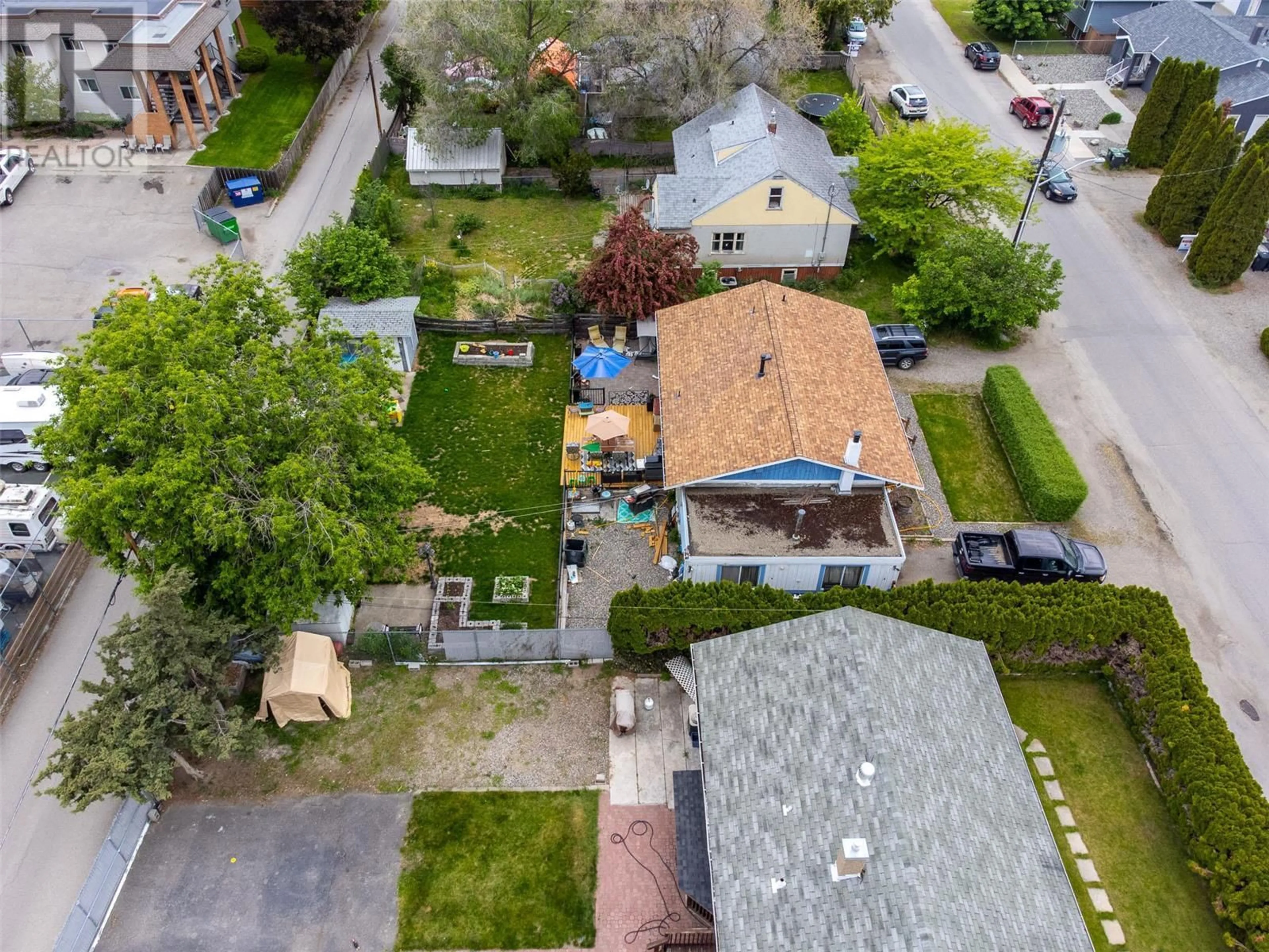 A pic from outside/outdoor area/front of a property/back of a property/a pic from drone, street for 235 Ponto Road, Kelowna British Columbia V1X2G2