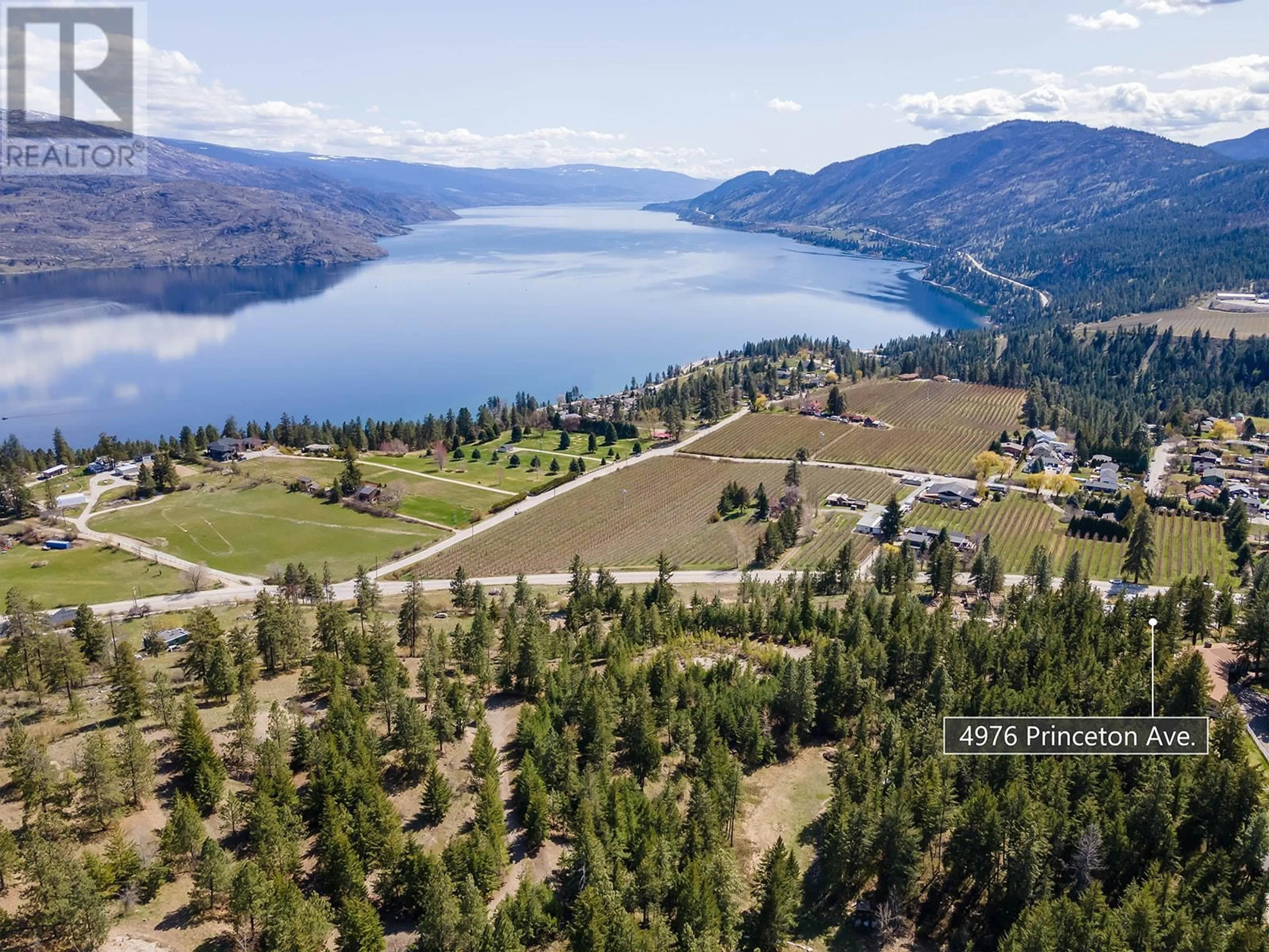 A pic from outside/outdoor area/front of a property/back of a property/a pic from drone, water/lake/river/ocean view for 4976 Princeton Avenue, Peachland British Columbia V0H1X8