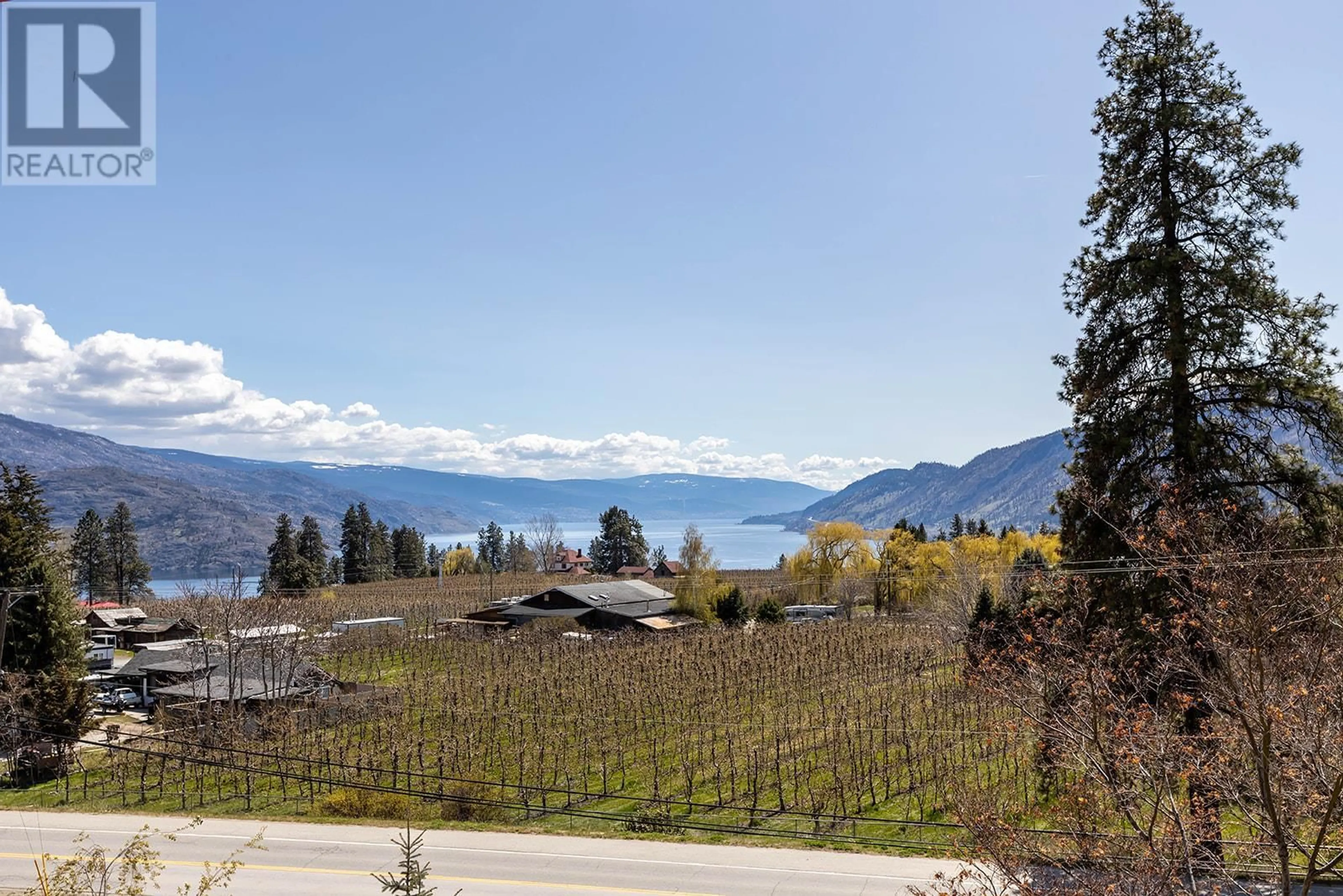 A pic from outside/outdoor area/front of a property/back of a property/a pic from drone, water/lake/river/ocean view for 4976 Princeton Avenue, Peachland British Columbia V0H1X8