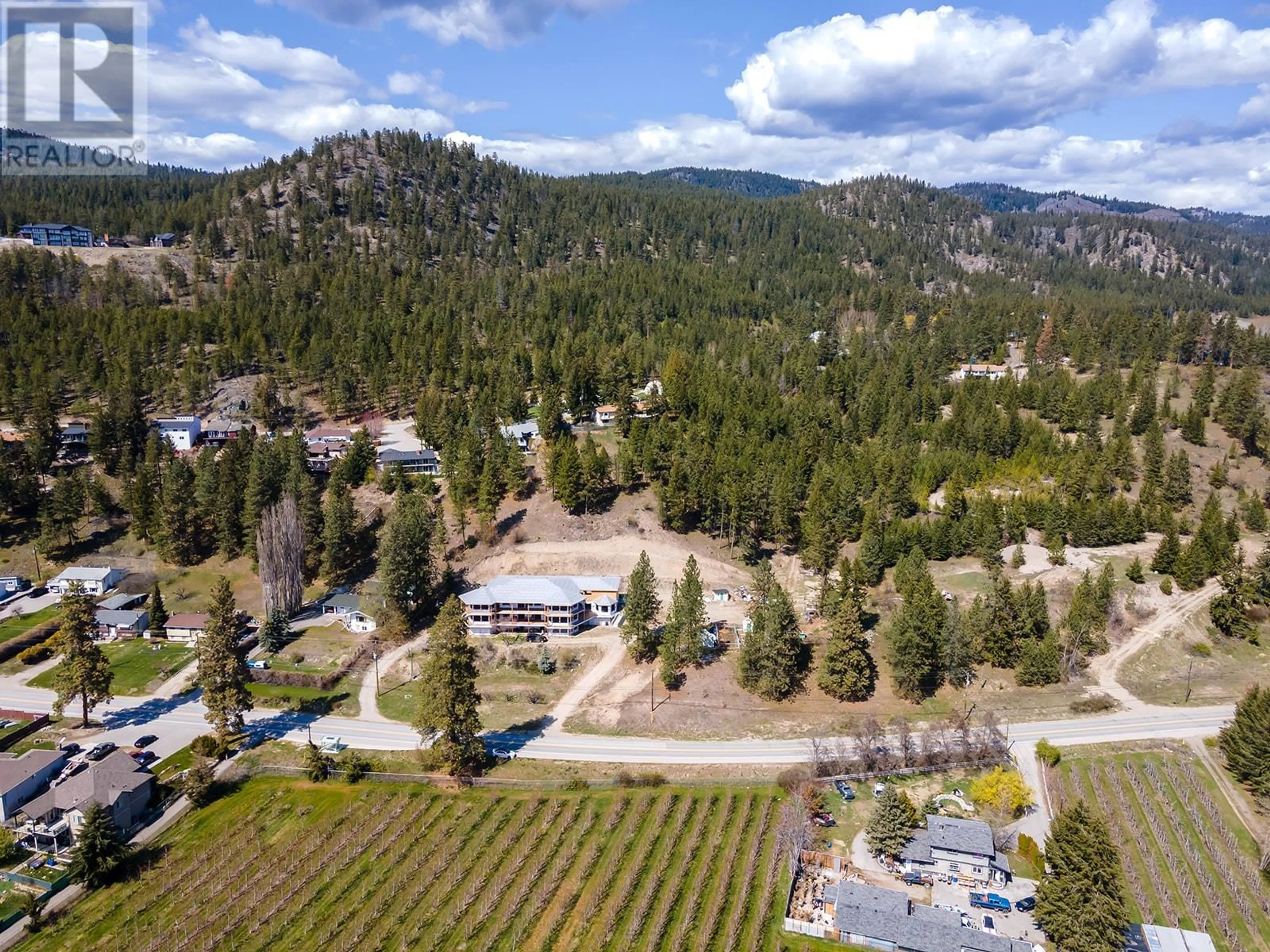 A pic from outside/outdoor area/front of a property/back of a property/a pic from drone, mountain view for 4976 Princeton Avenue, Peachland British Columbia V0H1X8