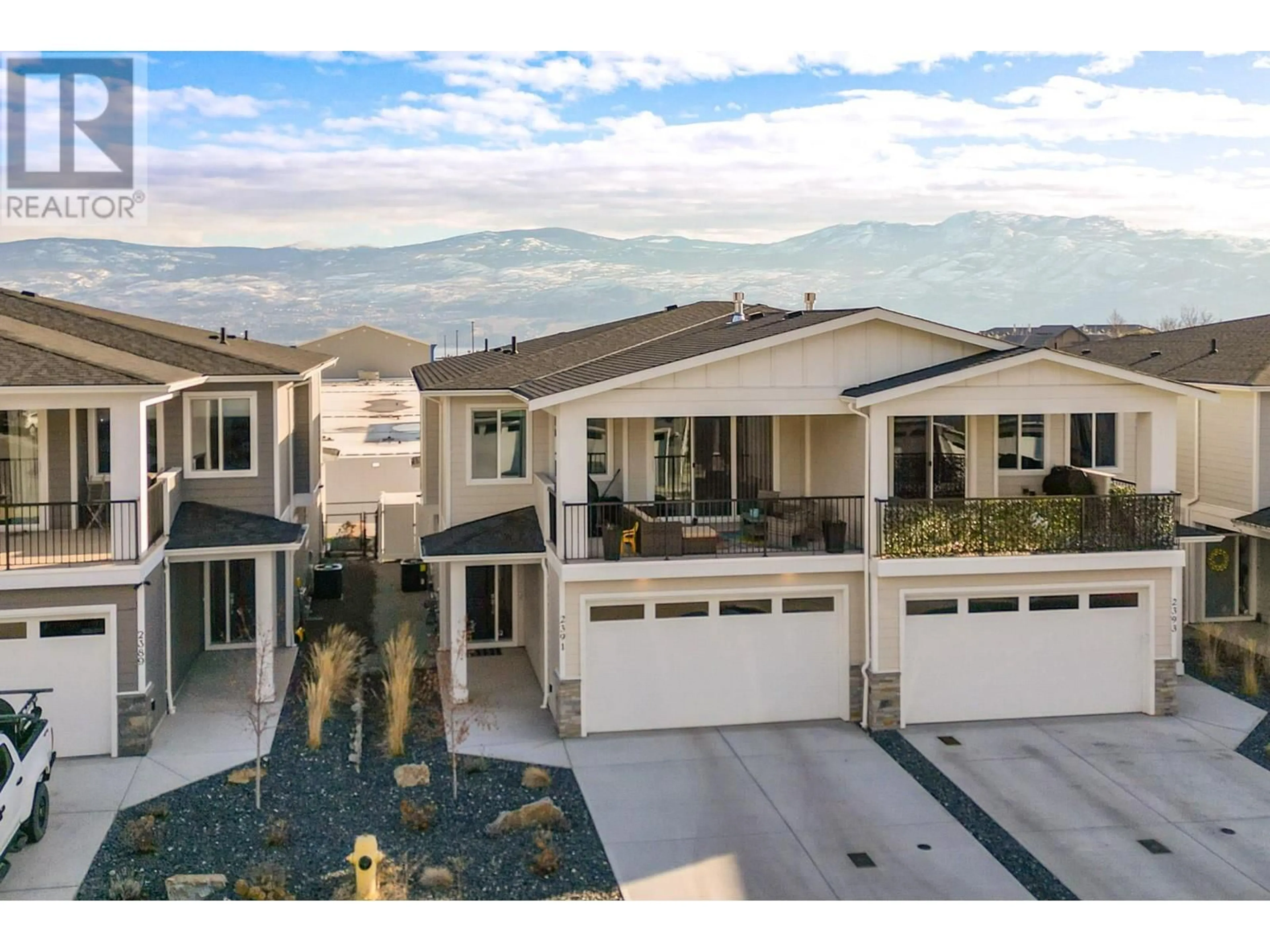 A pic from outside/outdoor area/front of a property/back of a property/a pic from drone, mountain view for 2391 Hawks Boulevard, West Kelowna British Columbia V4T0A7