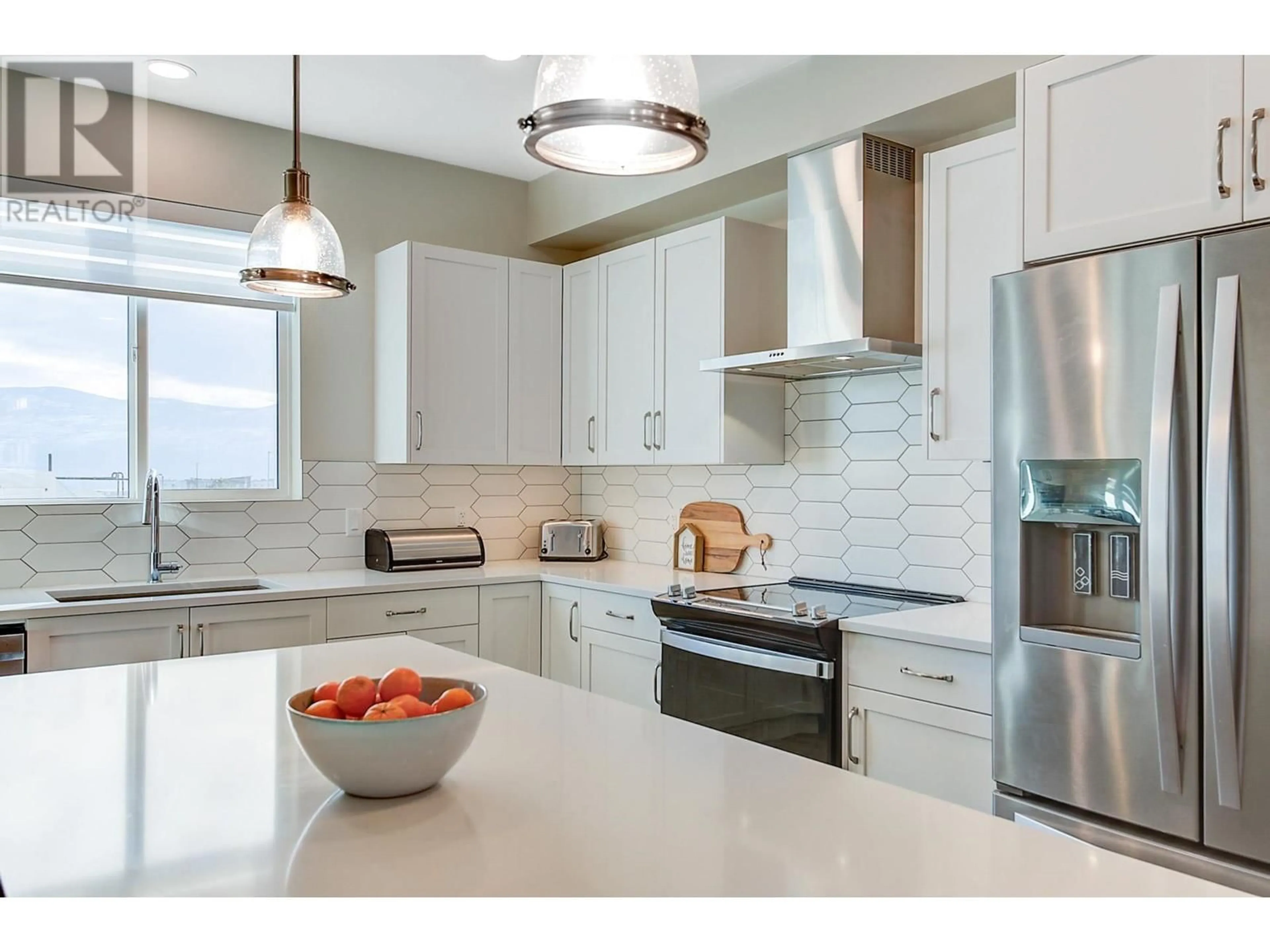 Contemporary kitchen, ceramic/tile floor for 2391 Hawks Boulevard, West Kelowna British Columbia V4T0A7