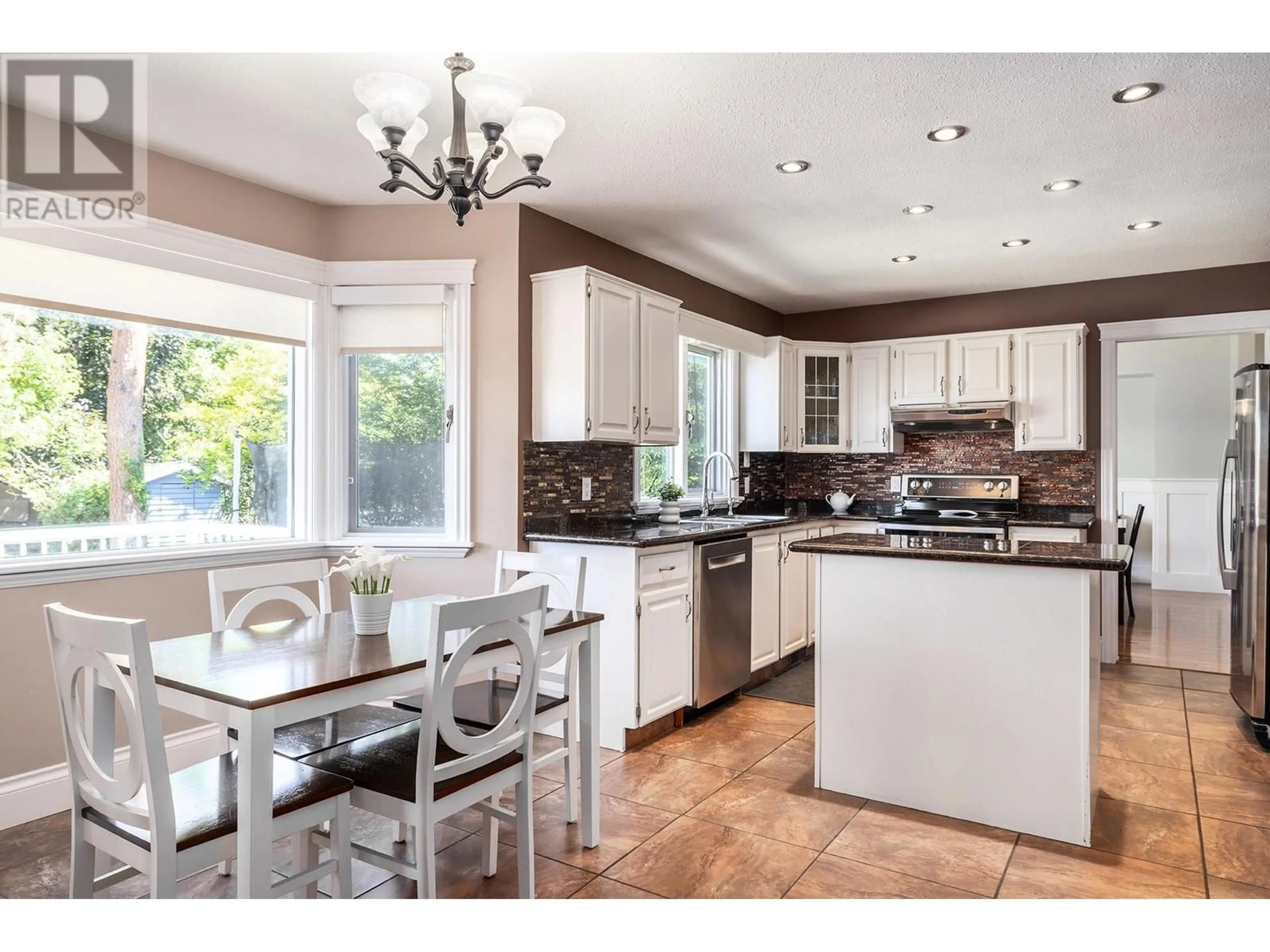 Open concept kitchen, unknown for 480 Curlew Drive, Kelowna British Columbia V1W4L1