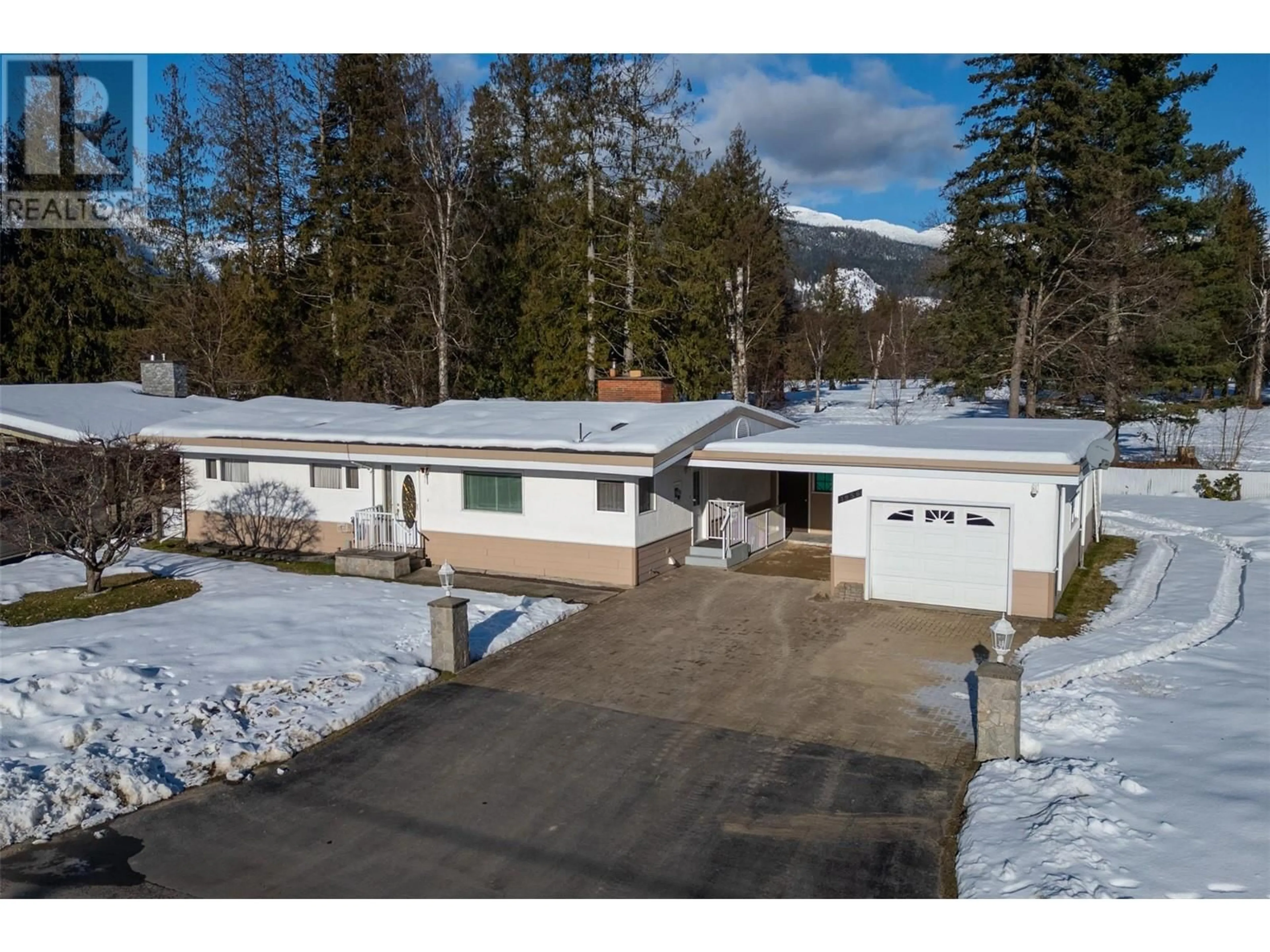 A pic from outside/outdoor area/front of a property/back of a property/a pic from drone, unknown for 1956 Fairway Road, Revelstoke British Columbia V0E2S0