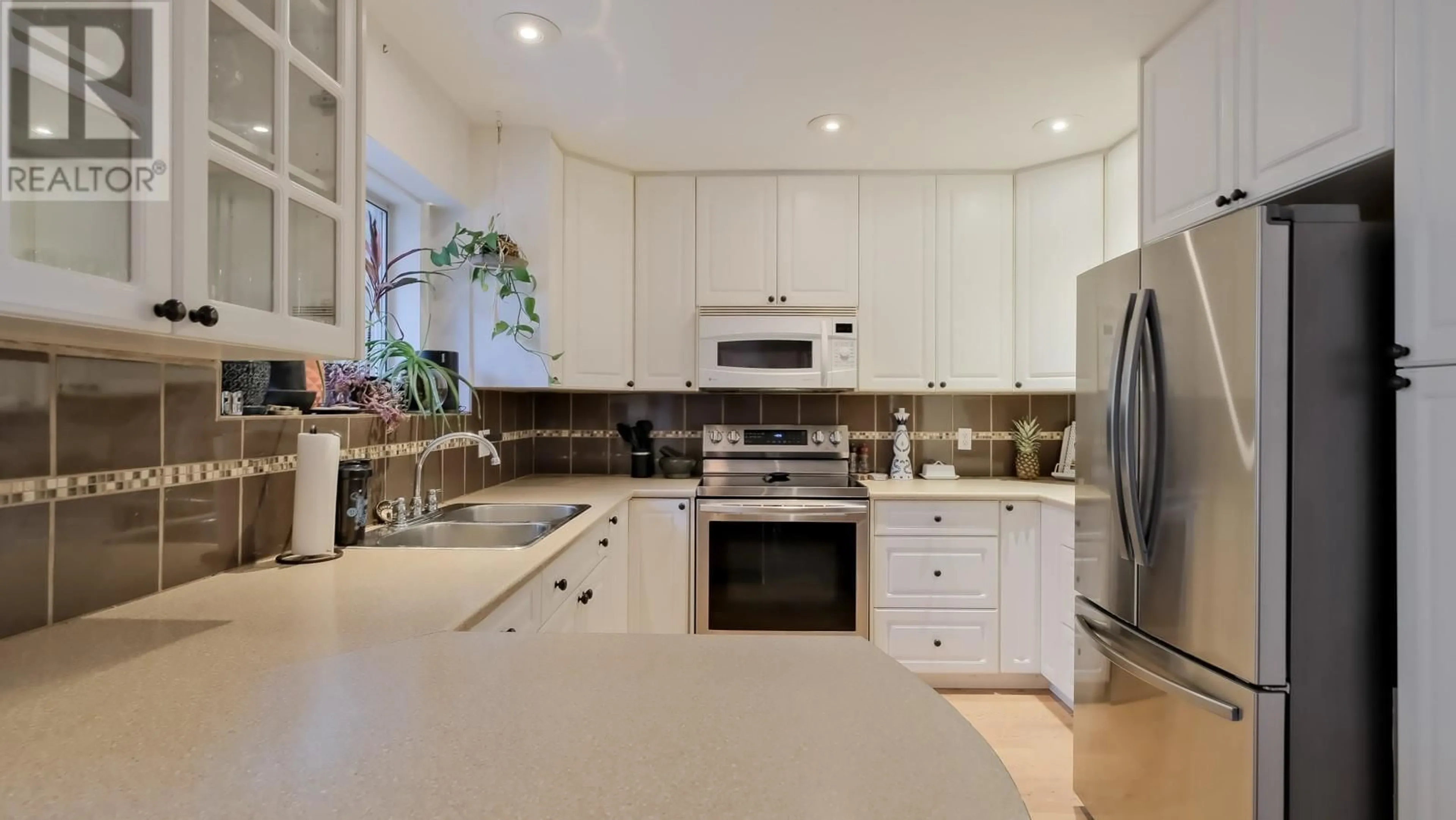 Open concept kitchen, ceramic/tile floor for 5271 CHUTE LAKE ROAD, Kelowna British Columbia V1W4K8