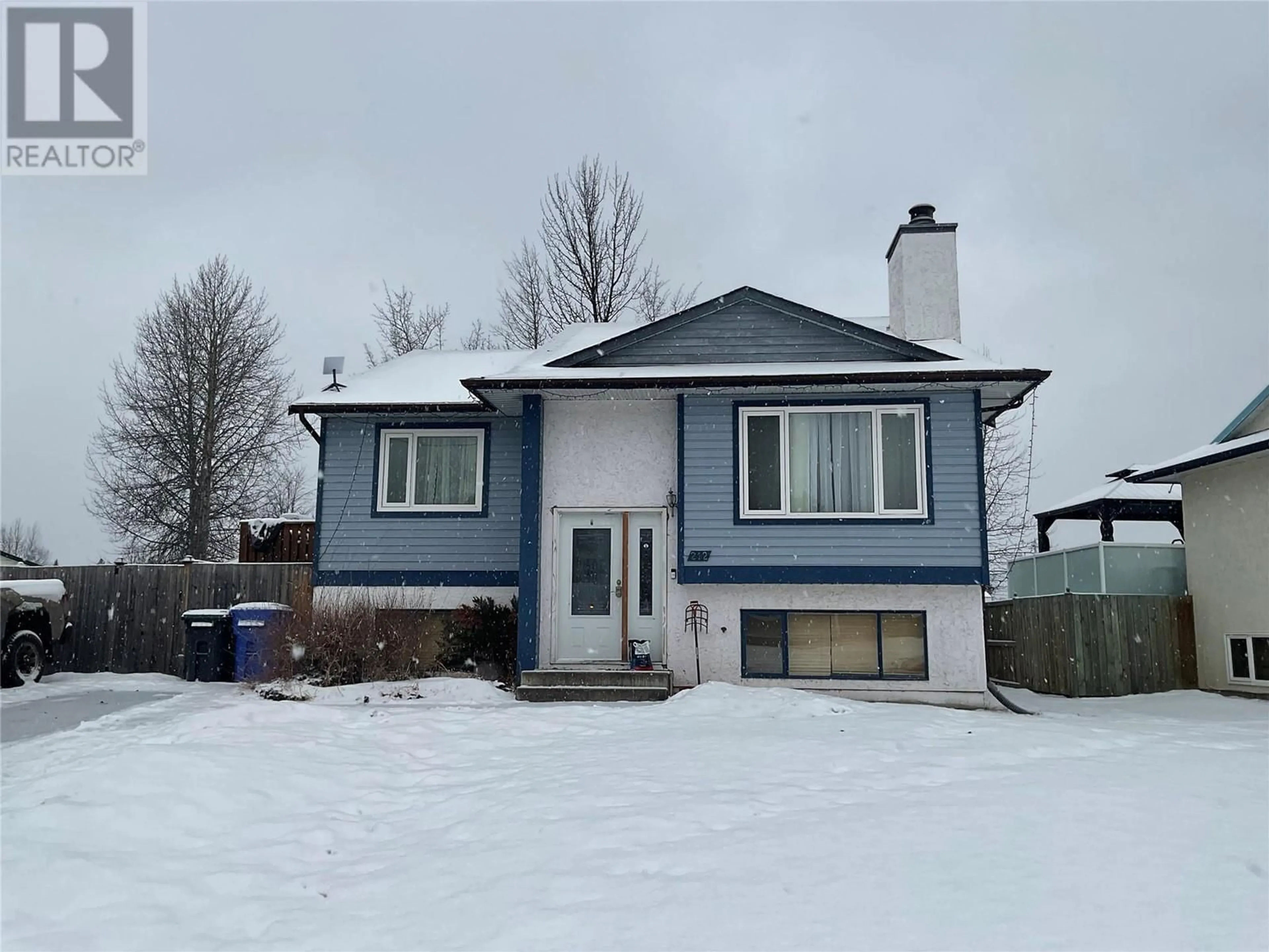 Home with vinyl exterior material, street for 212 Spruce Avenue, Tumbler Ridge British Columbia V0C2W0