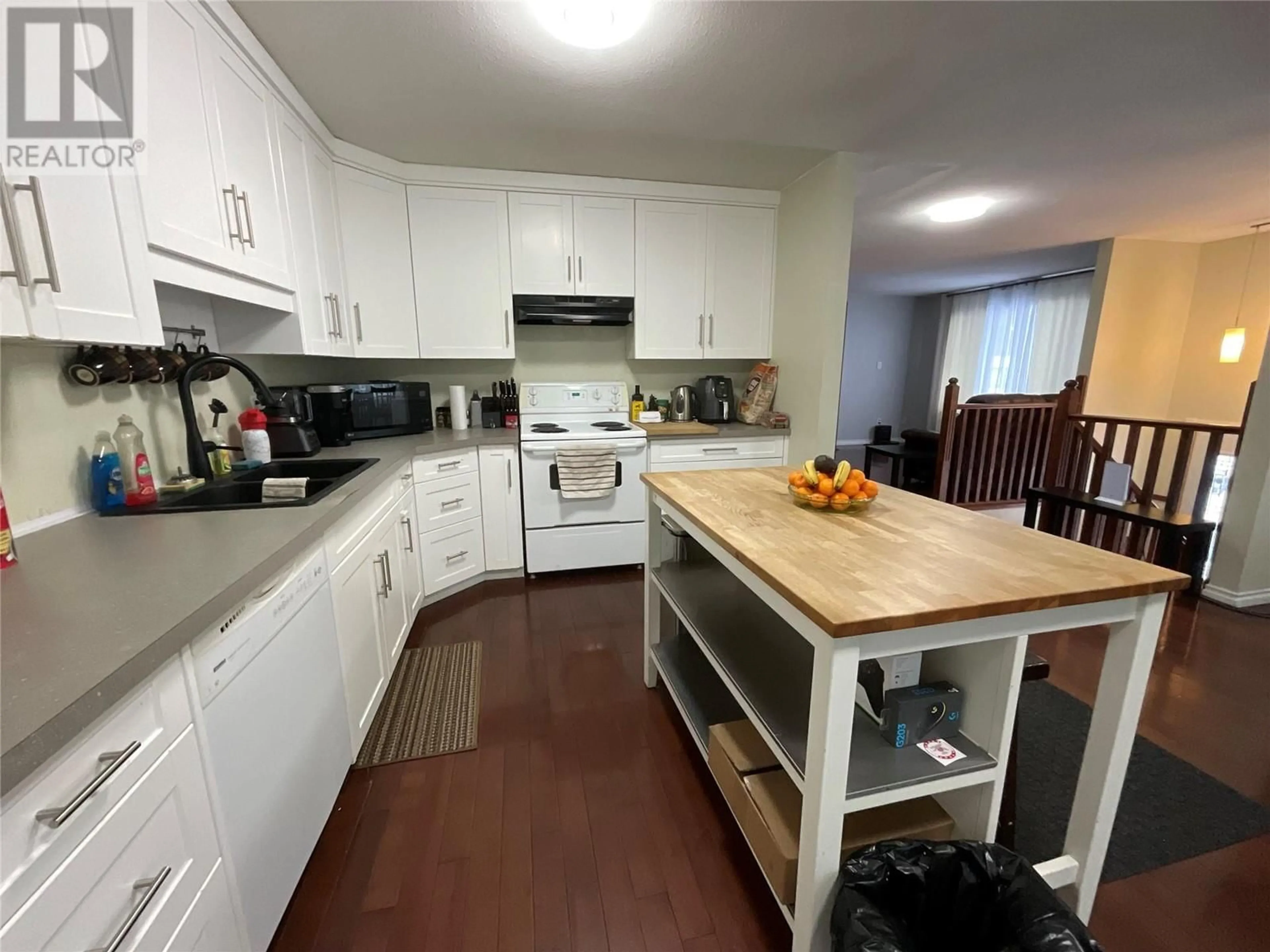 Open concept kitchen, unknown for 212 Spruce Avenue, Tumbler Ridge British Columbia V0C2W0