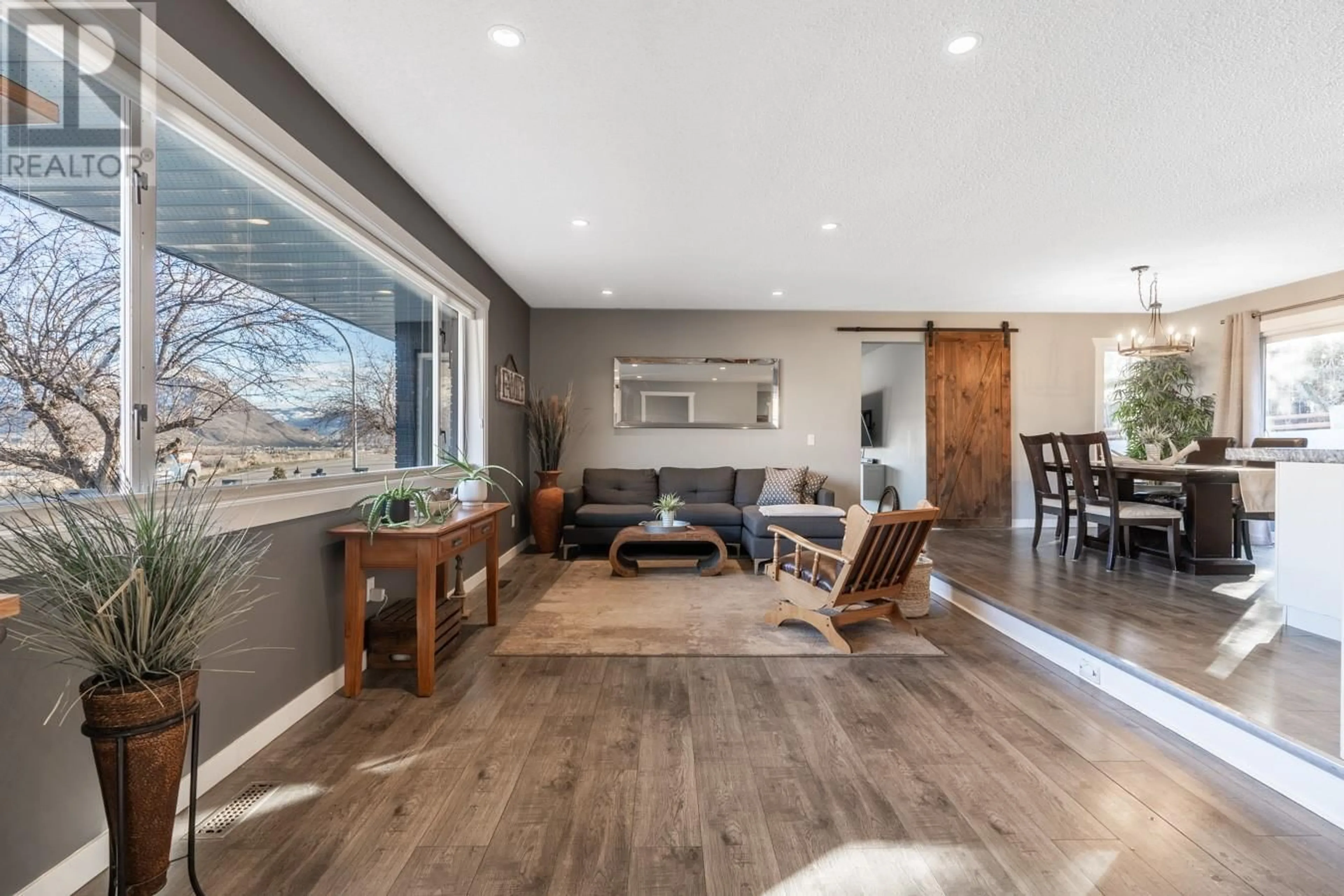 Living room with furniture, wood/laminate floor for 1708 North River Drive, Kamloops British Columbia V2B7N5