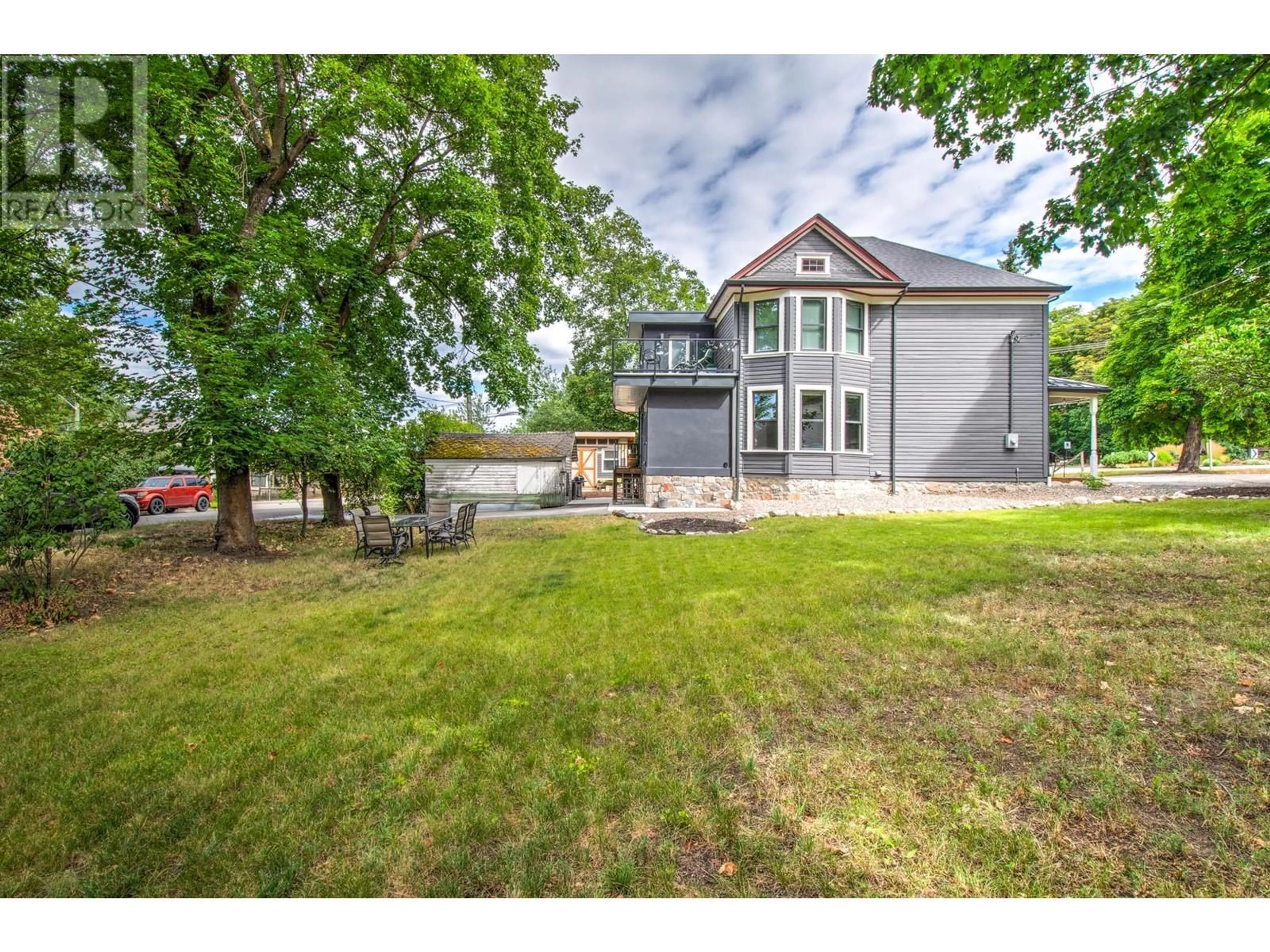 A pic from outside/outdoor area/front of a property/back of a property/a pic from drone, unknown for 3102 PLEASANT VALLEY ROAD, Vernon British Columbia V1T4L3