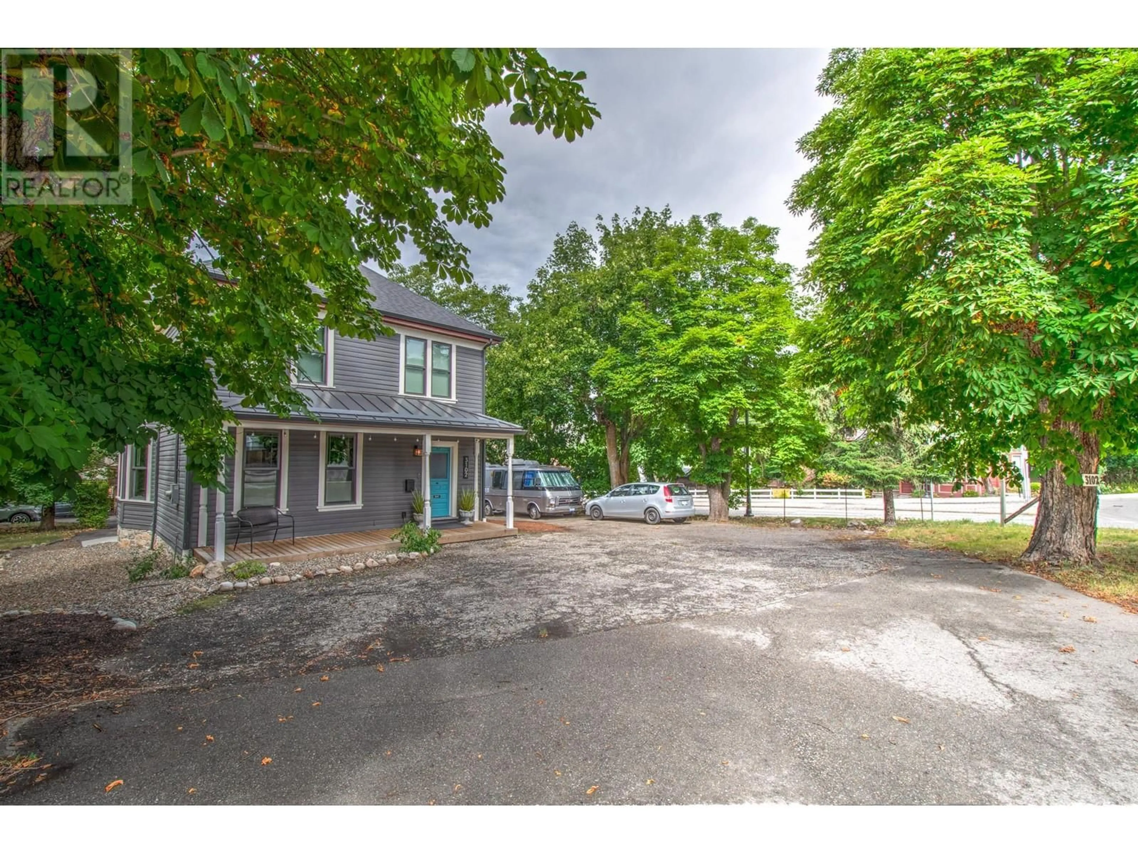 A pic from outside/outdoor area/front of a property/back of a property/a pic from drone, street for 3102 PLEASANT VALLEY ROAD, Vernon British Columbia V1T4L3