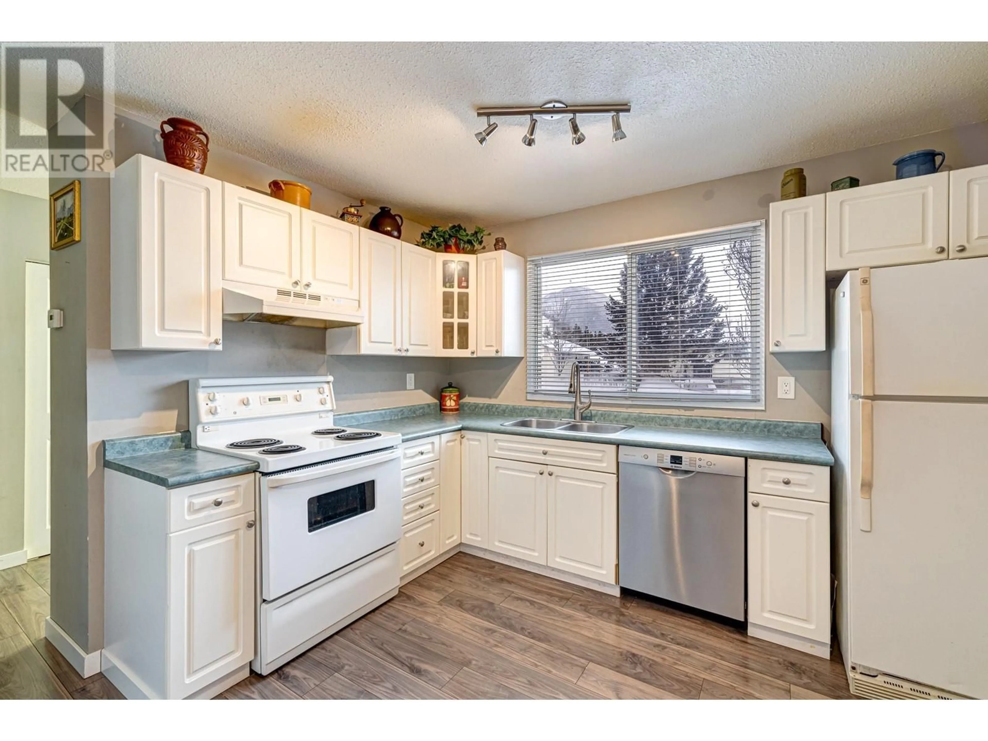 Open concept kitchen, unknown for 403B Mountain Ash Crescent, Sparwood British Columbia V0B2G0