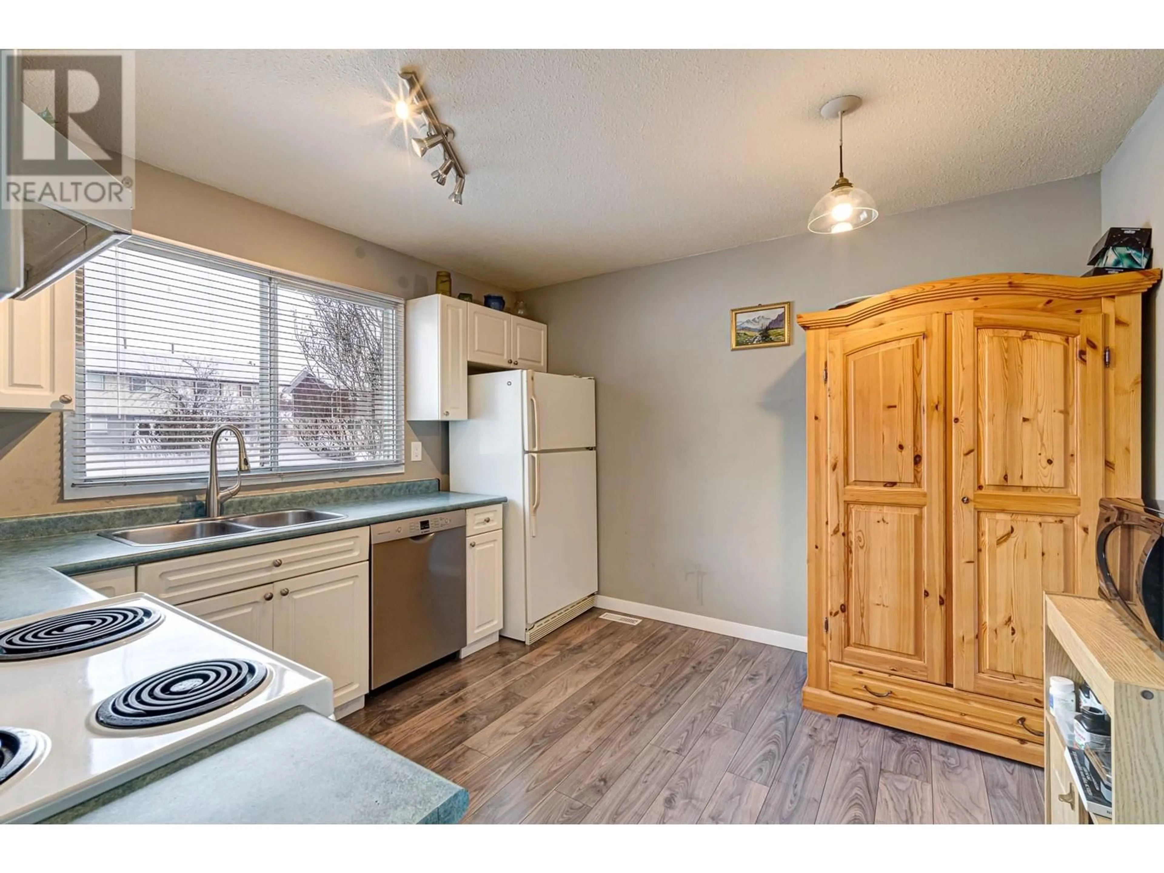 Standard kitchen, wood/laminate floor for 403B Mountain Ash Crescent, Sparwood British Columbia V0B2G0