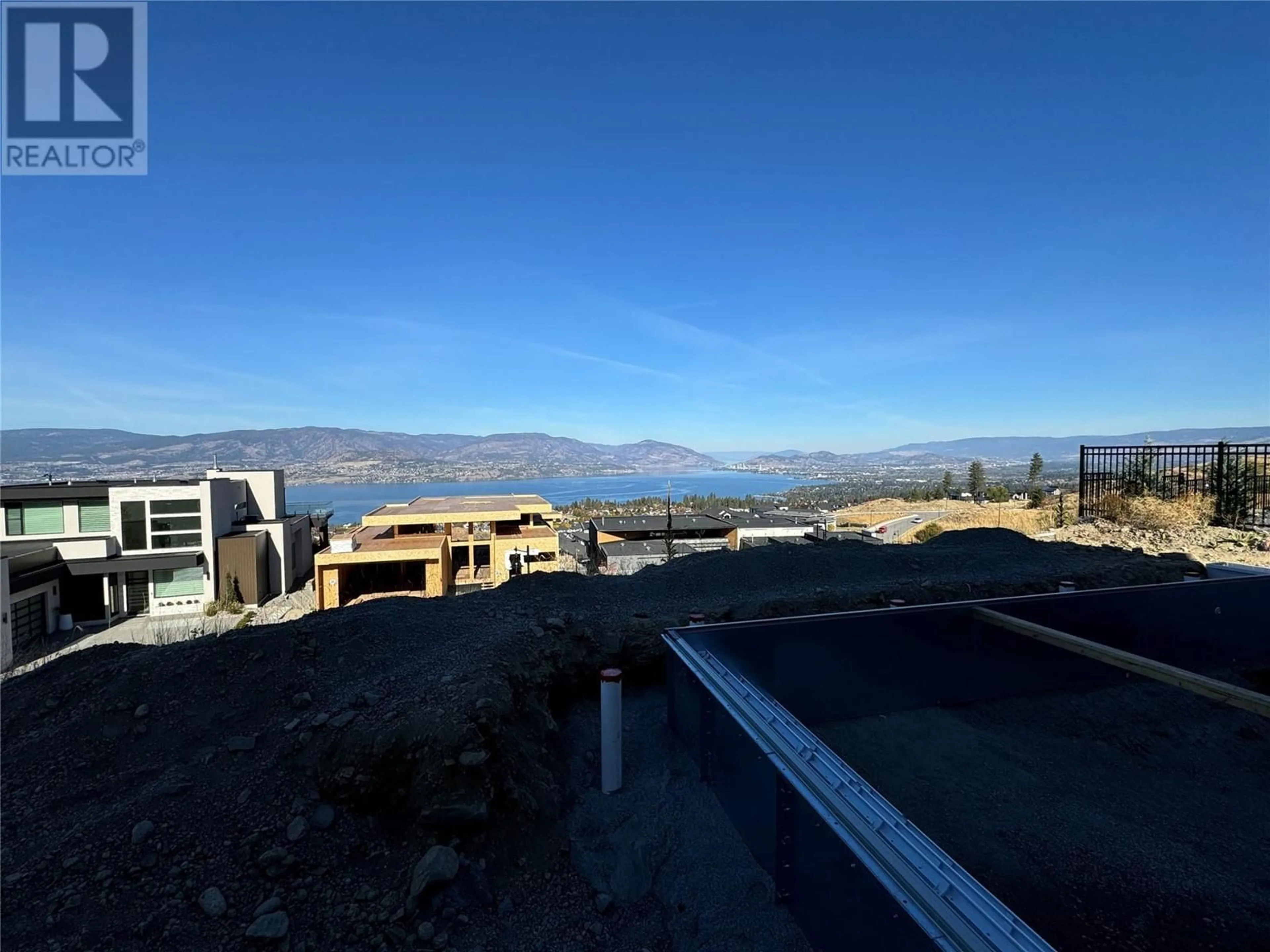 A pic from outside/outdoor area/front of a property/back of a property/a pic from drone, mountain view for 5631 Upper Mission Court, Kelowna British Columbia V1W0C5